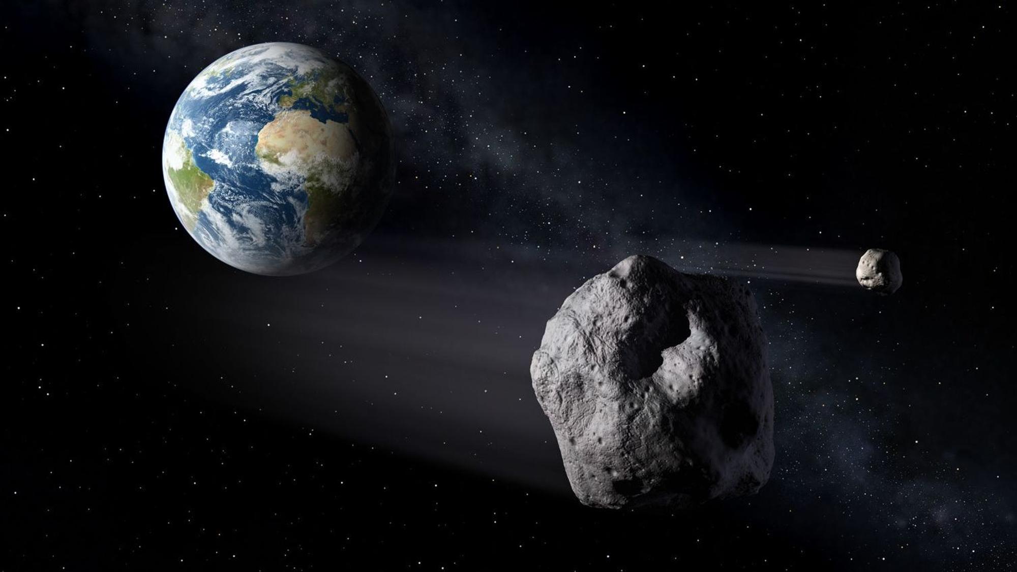 Ein Asteroid nähert sich der Erde.