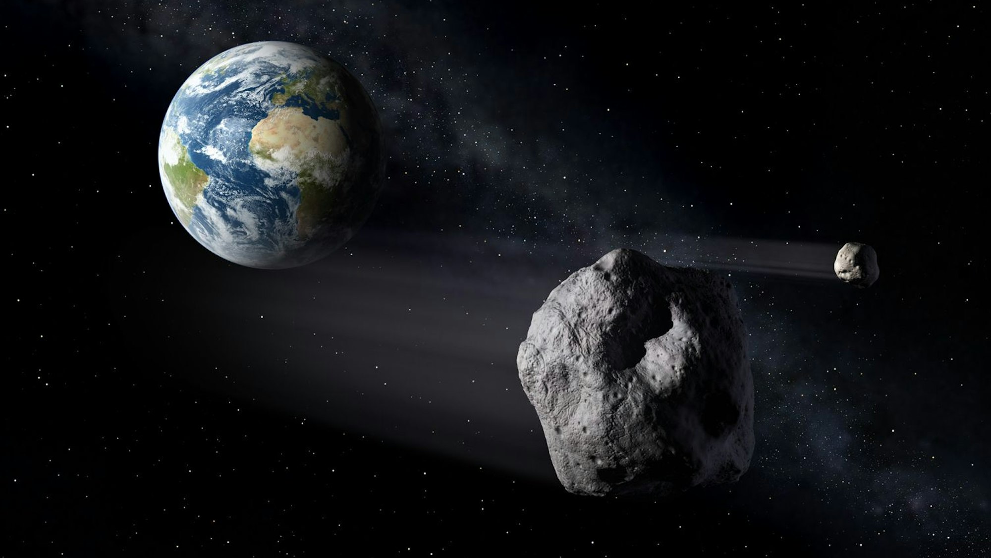 Ein Asteroid nähert sich der Erde.