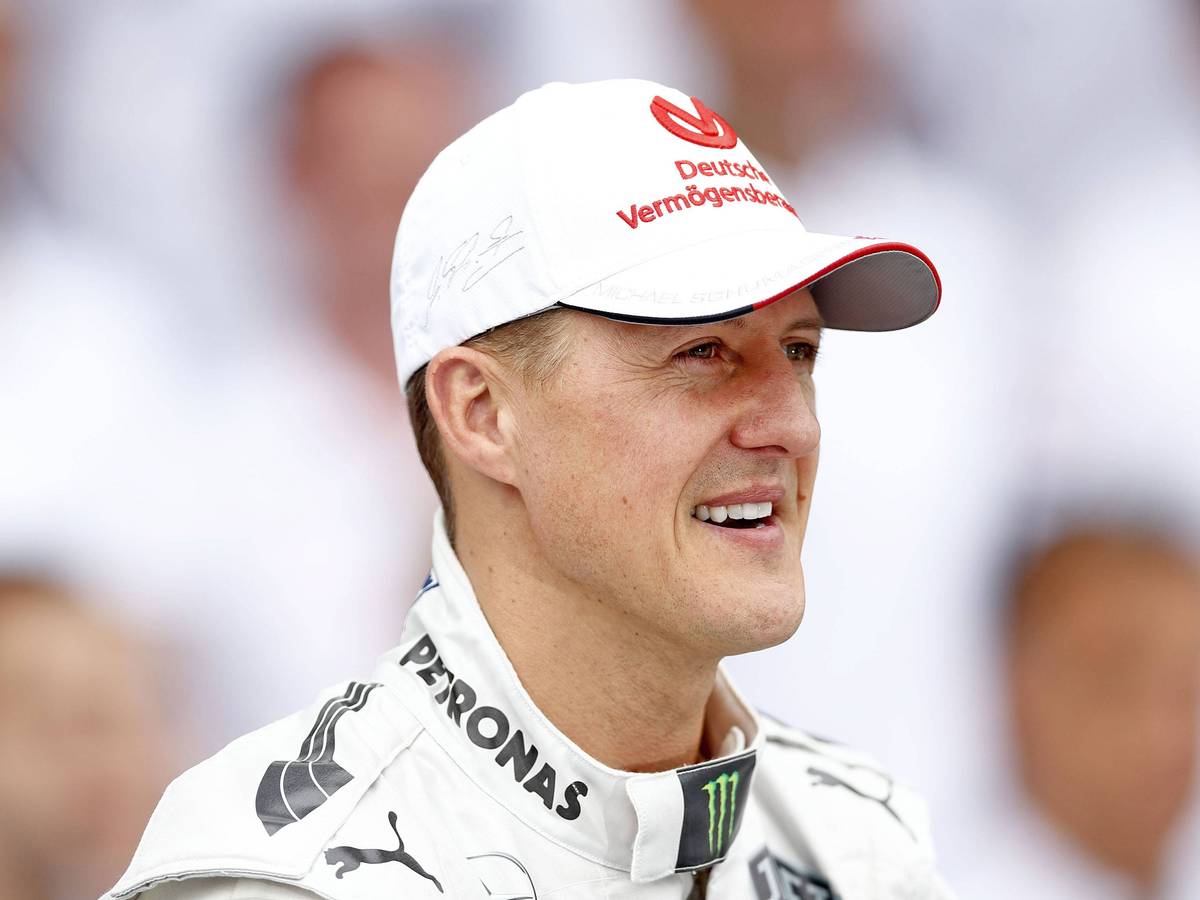Michael Schumacher, mit guter Laune, schaut sich 2012 das Rennen in Brasilien an.