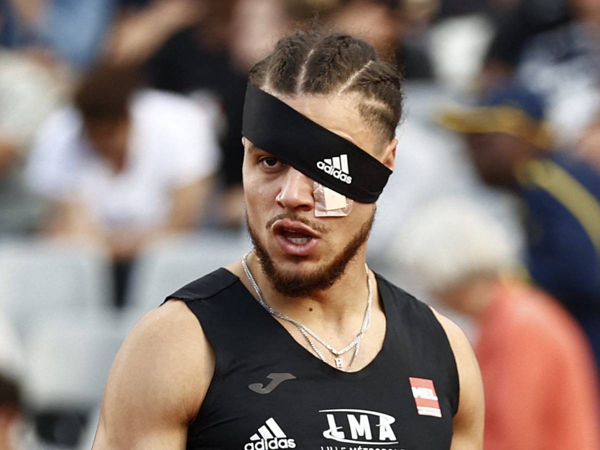 Wilfried Happio mit Pflaster und Stirnband über dem Auge.