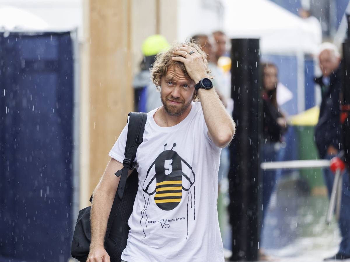 Rennfahrer Sebastian Vettel im Regen.