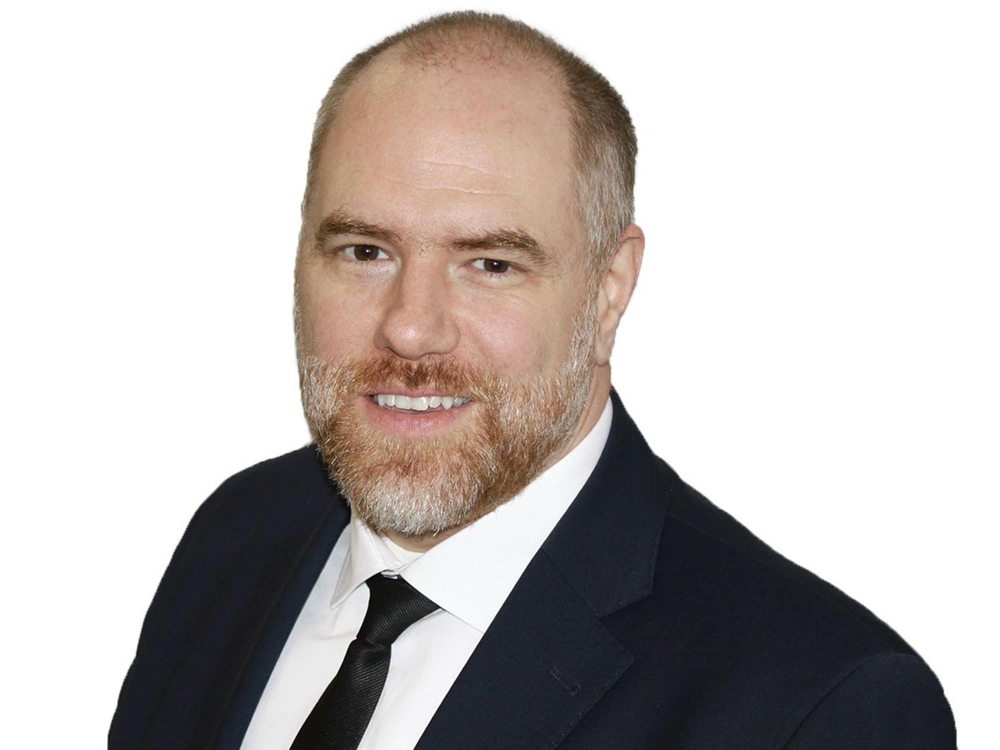Stephan Krüger schaut in die Kamera.