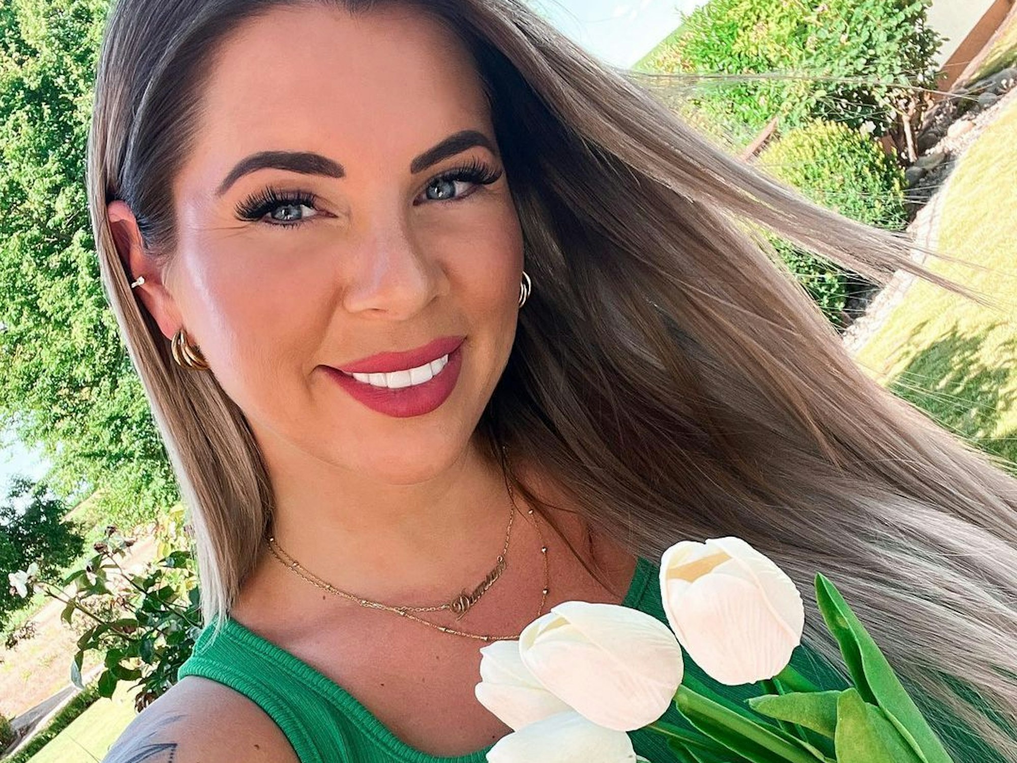 Jenny Frankhauser lächelt auf einem Instagram-Selfie.