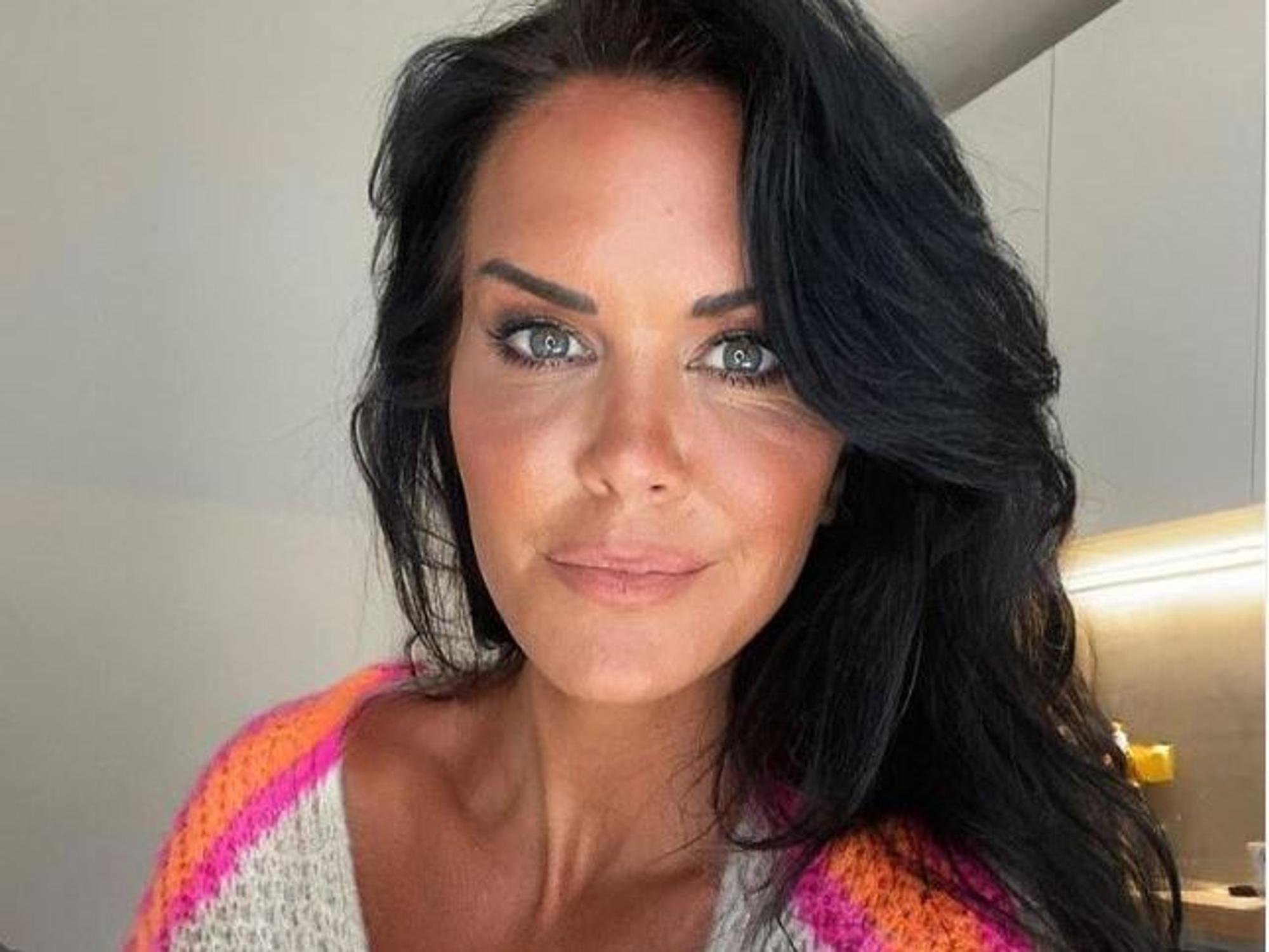 Martina Reuter lächelt auf einem Selfie in die Kamera