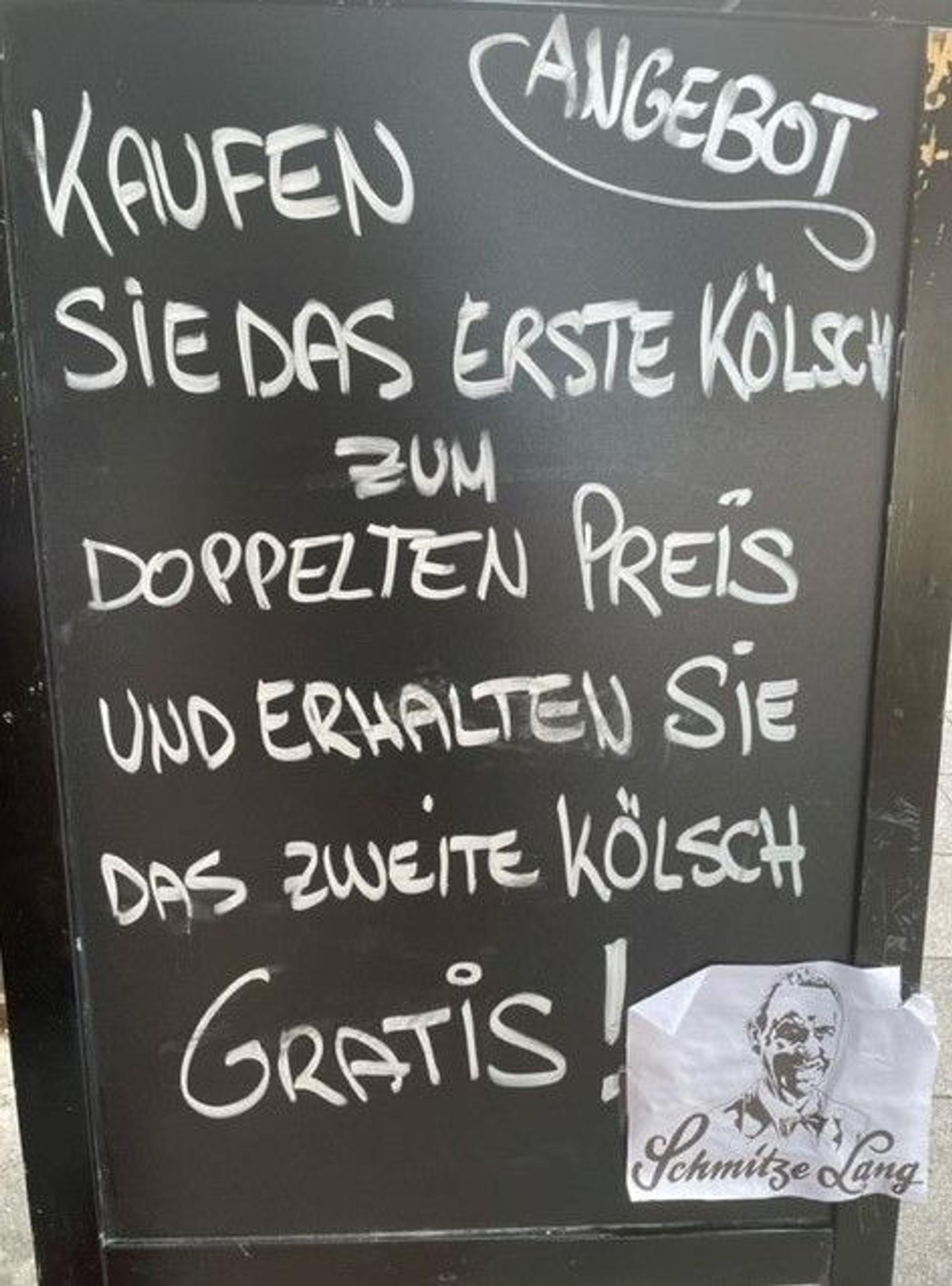 Menüschild der Gaststätte „Schmitze Lang“ in der Kölner Südstadt.