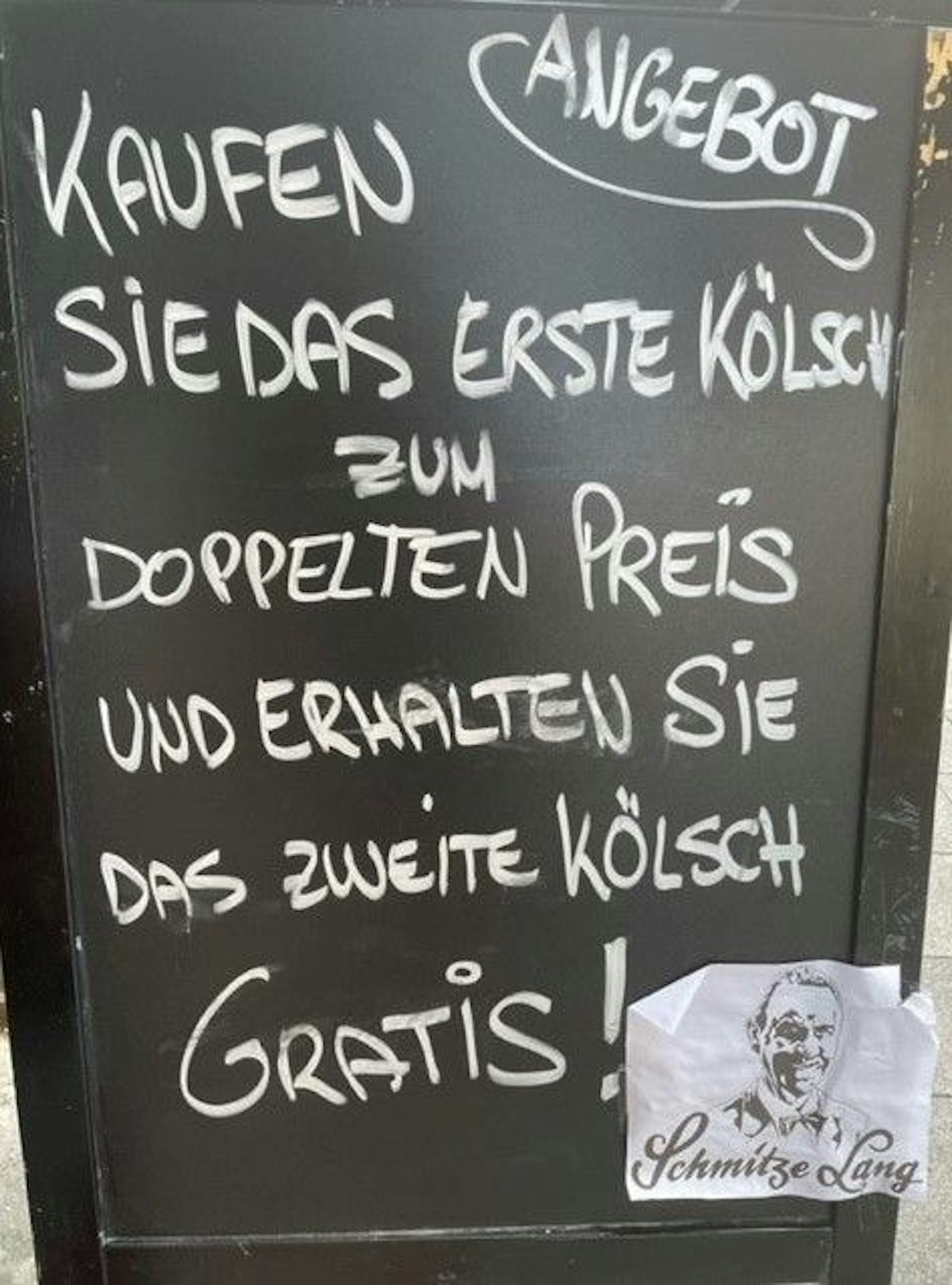 Menüschild der Gaststätte „Schmitze Lang“ in der Kölner Südstadt.