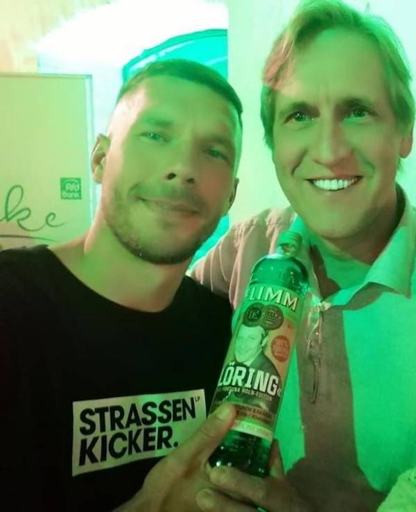 Lukas Podolski mit Cornel Wachter