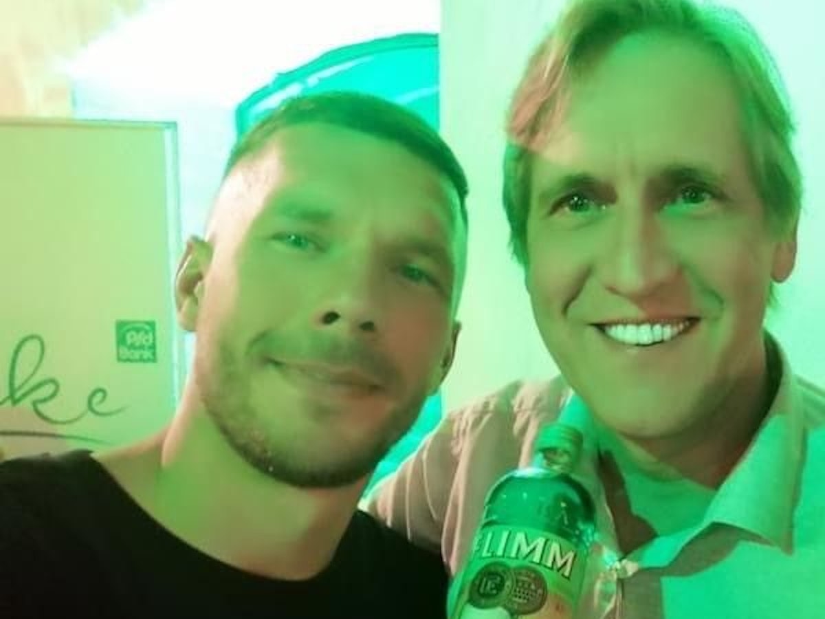 Lukas Podolski mit Cornel Wachter