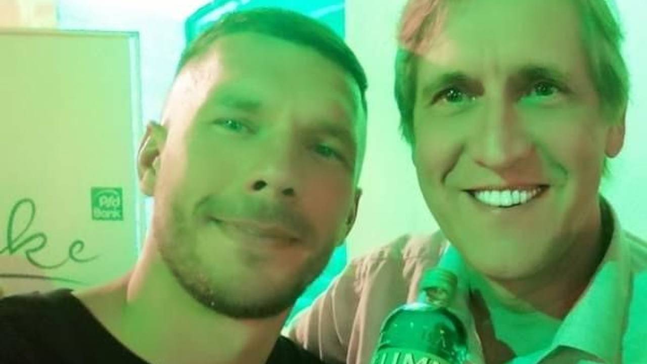 Lukas Podolski mit Cornel Wachter