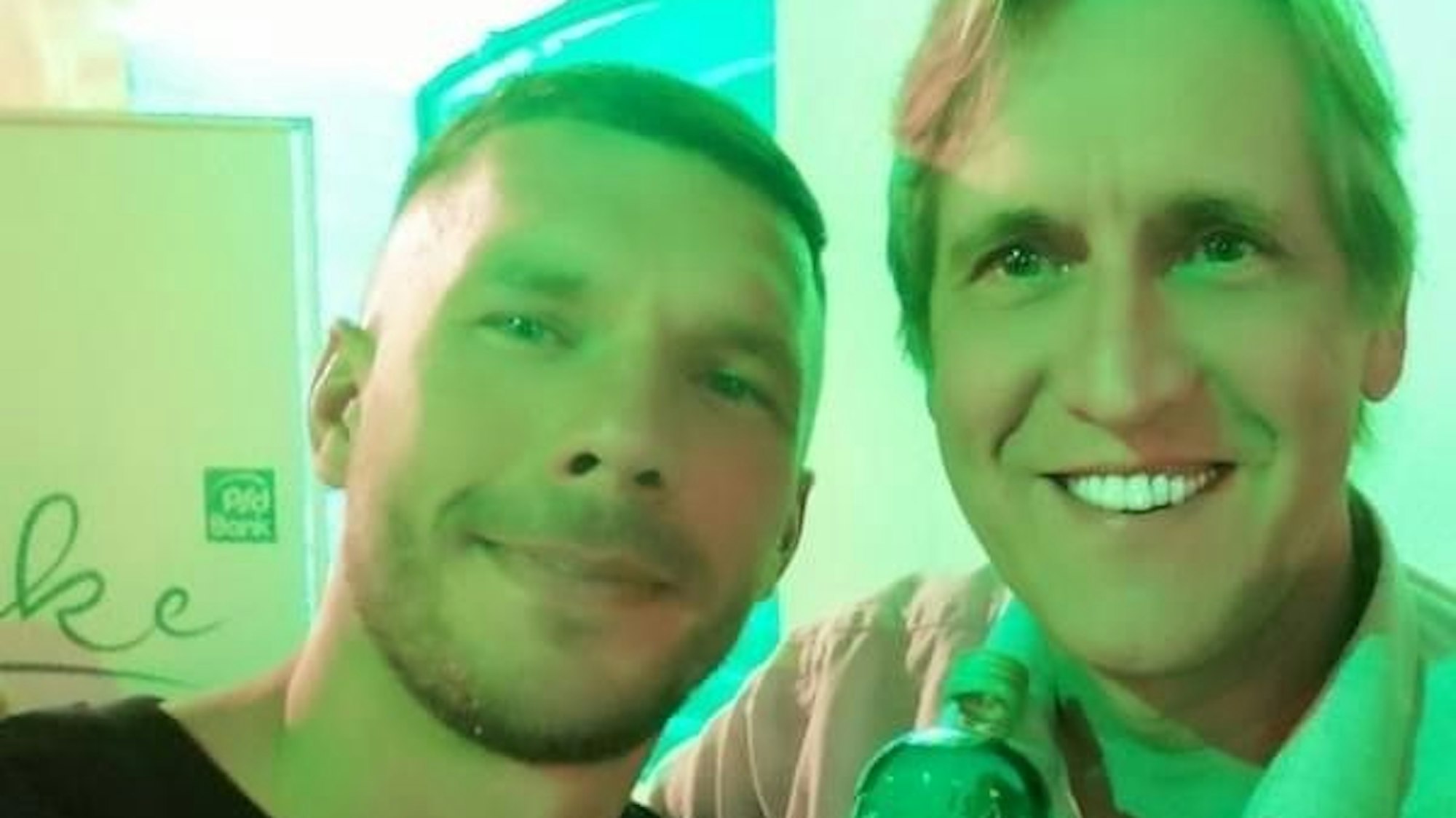 Lukas Podolski mit Cornel Wachter