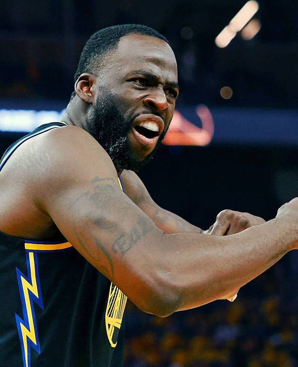 Warriors-Star Draymond Green in kämpferischer Haltung.
