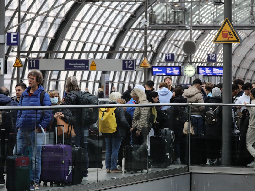 BERLIN, GERMANY - OCTOBER 08: People crowd on the platform at Berlin’s central station, following a disruption to rail services across northern Germany on October 8, 2022 in Berlin, Germany. Authorities claim sabotage of cables in the digital infrastructure of German state rail carrier Deutsche Bahn is the cause of a total disruption that affected rail connections in the northern states of Lower Saxony and Schleswig-Holstein. (Photo by Omer Messinger/Getty Images)