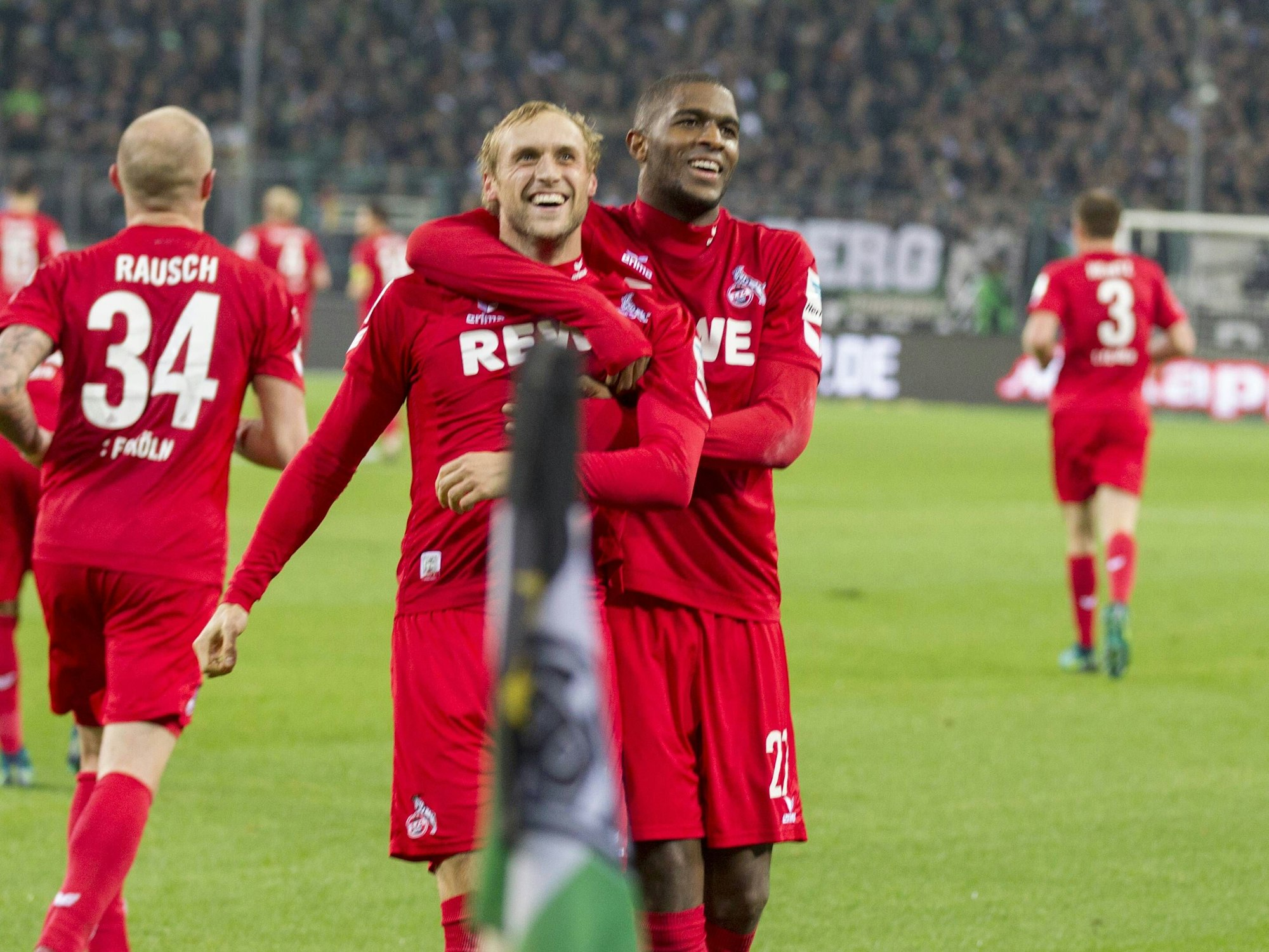 Marcel Risse und Anthony Modeste jubeln.