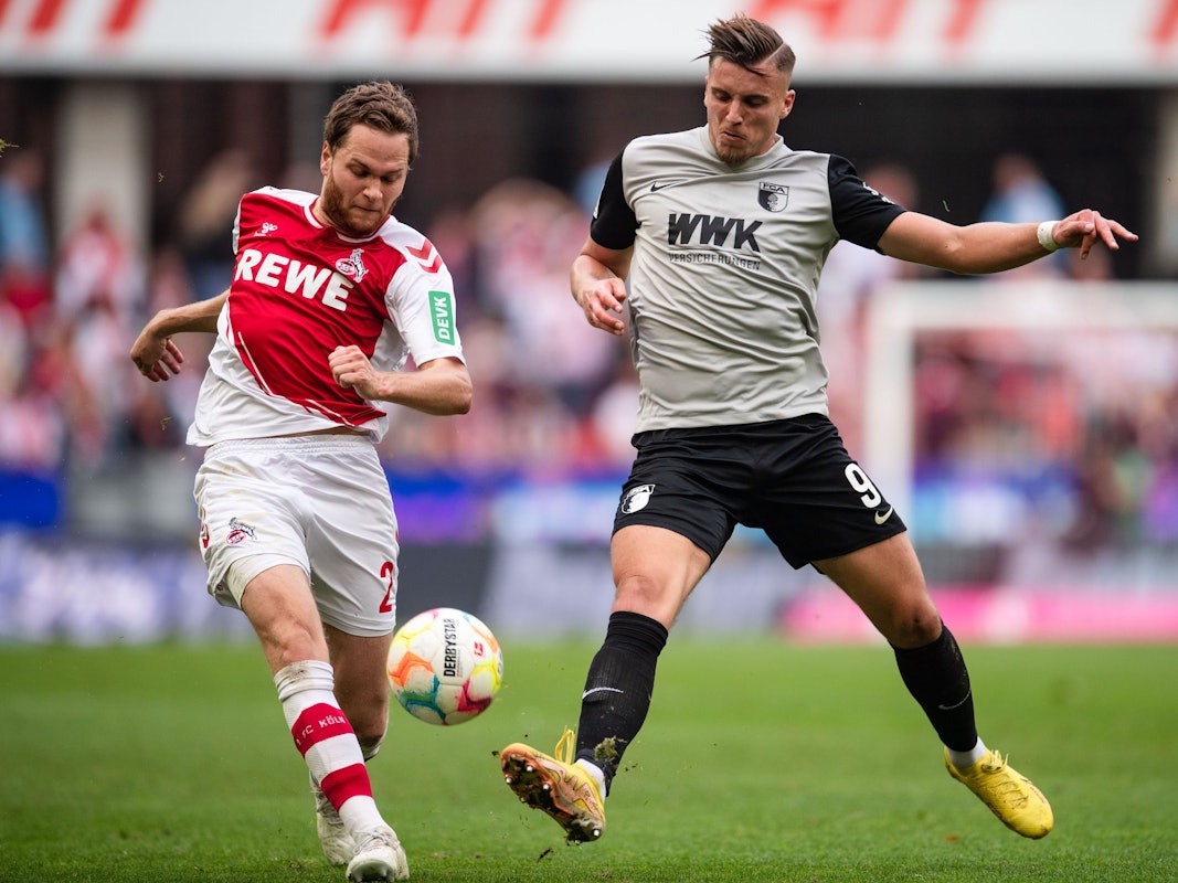 Benno Schmitz im Kampf um den Ball mit Ermedin Demirovic.