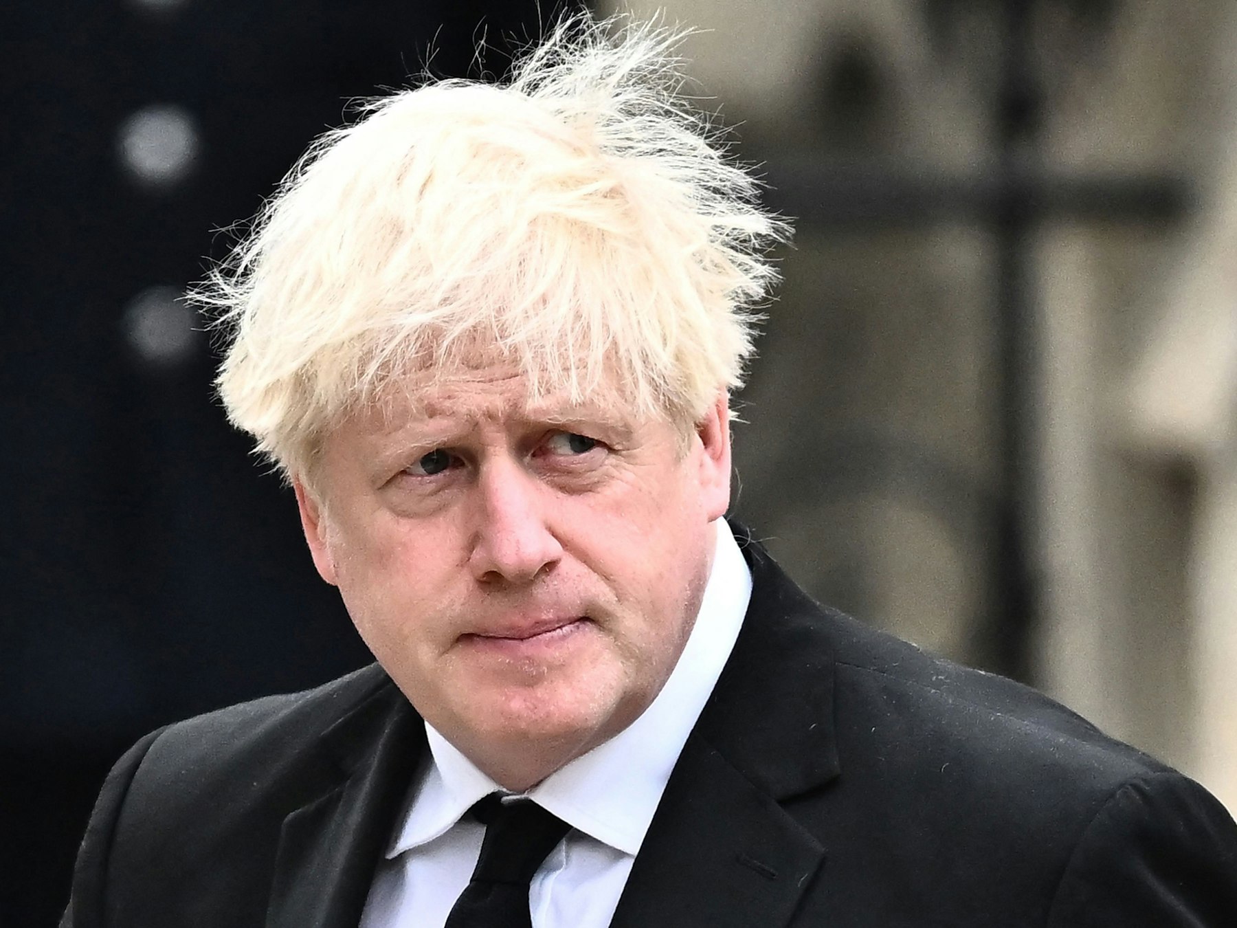 Das Foto zeigt Boris Johnson auf der Beerdigung von Queen Elizabeth II.