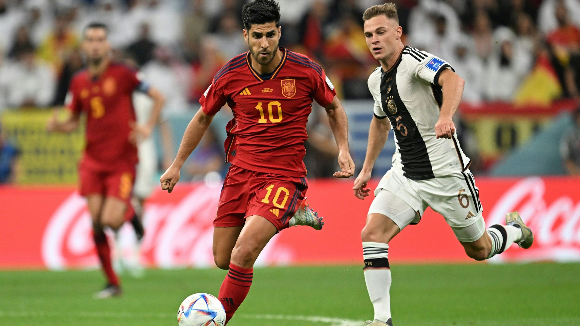 Joshua Kimmich und Marco Asensio im WM-Gruppenspiel