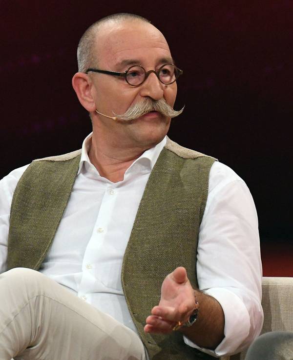 Horst Lichter im weißen Hemd bei einer Veranstaltung.