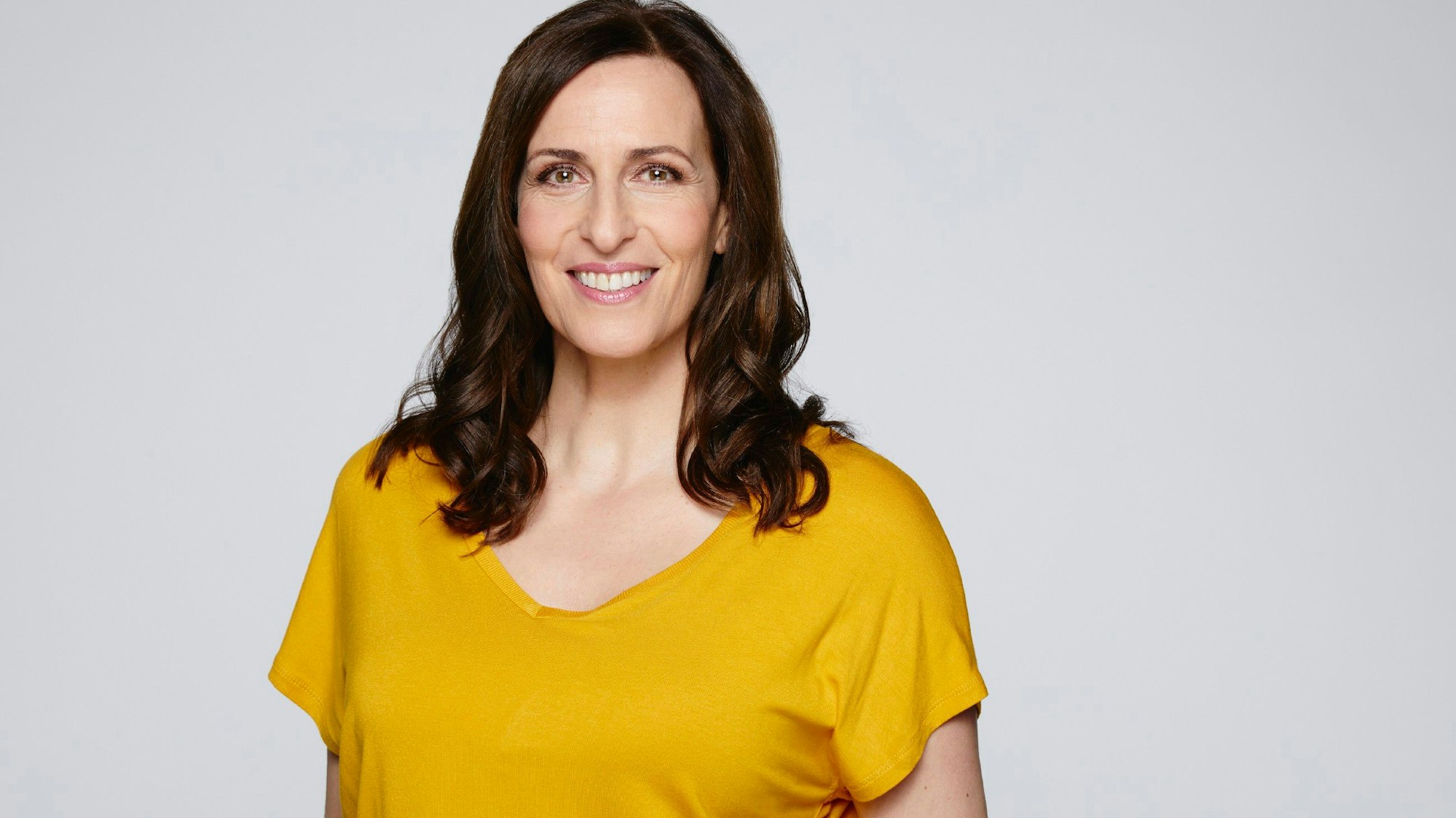 Ulrike Frank posiert für ein Foto.