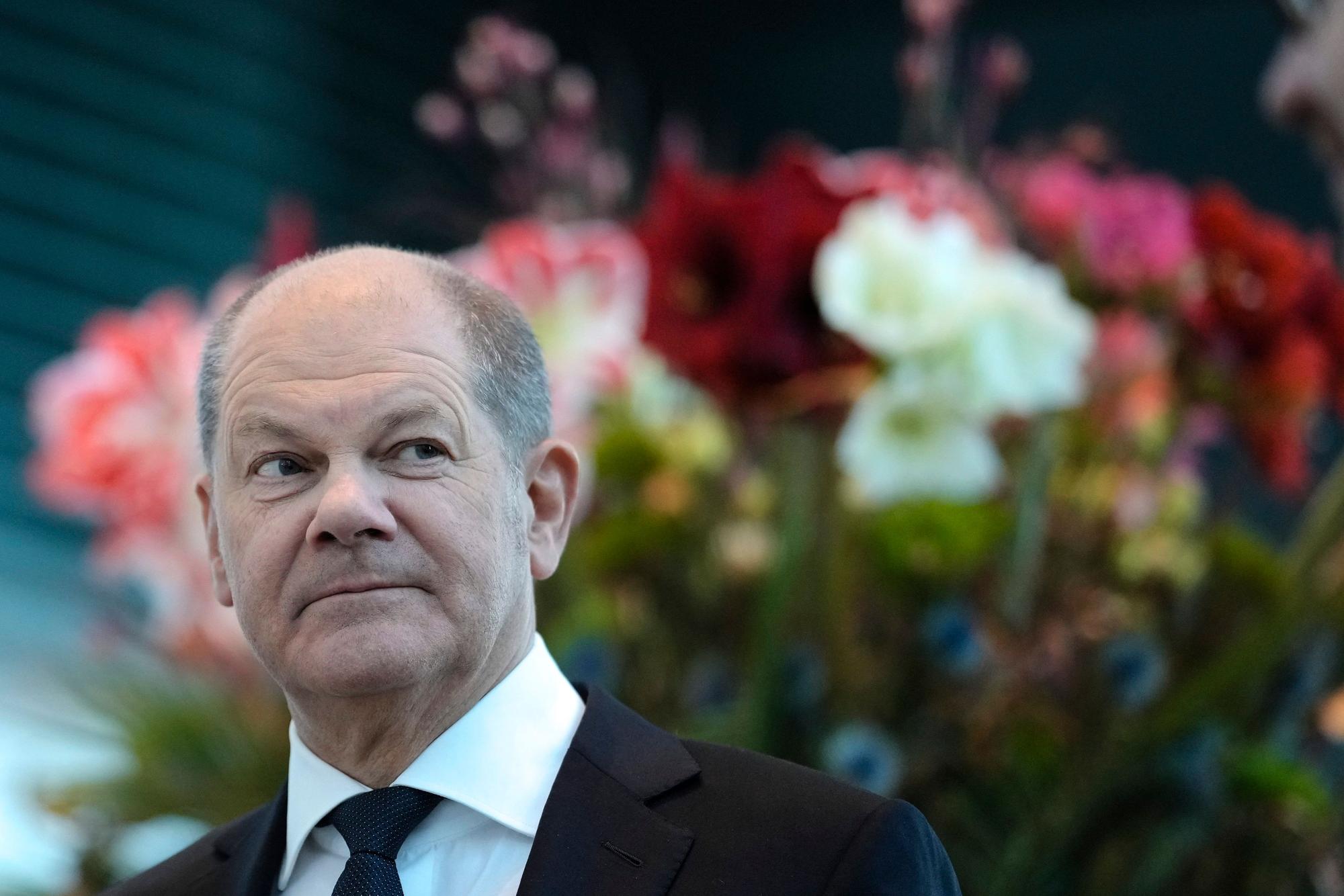 German chancellor Olaf Scholz arrives to attend a reception for carol singers from all over Germany at the chancellery in Berlin, Germany, Thursday, Jan. 5, 2023. (AP Photo/Markus Schreiber)