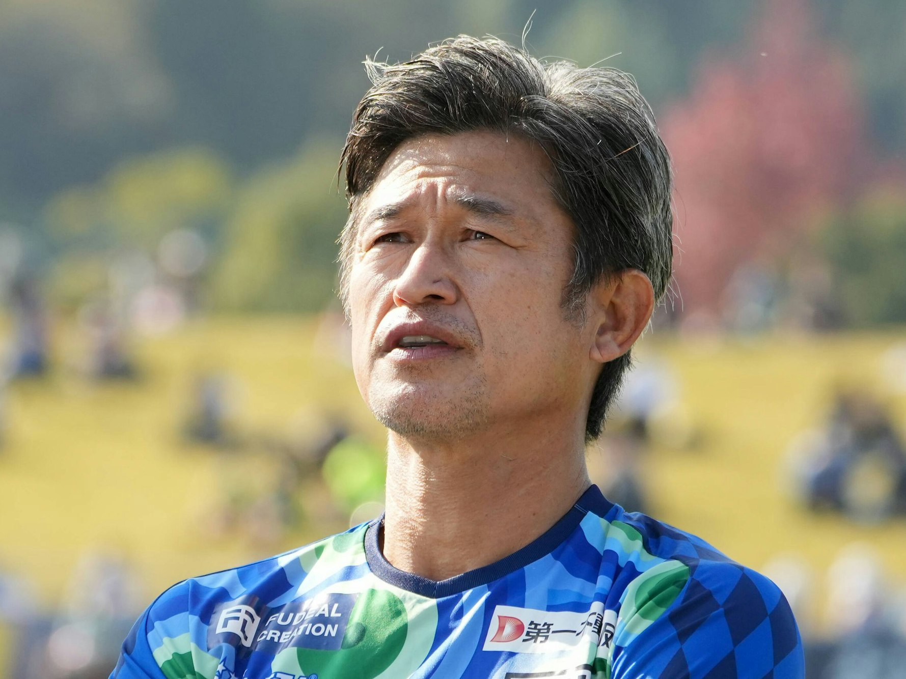 Kazu Miura mit verschränkten Armen, mit 55 Jahren ist er der älteste Fußball-Profi im Jahr 2023.