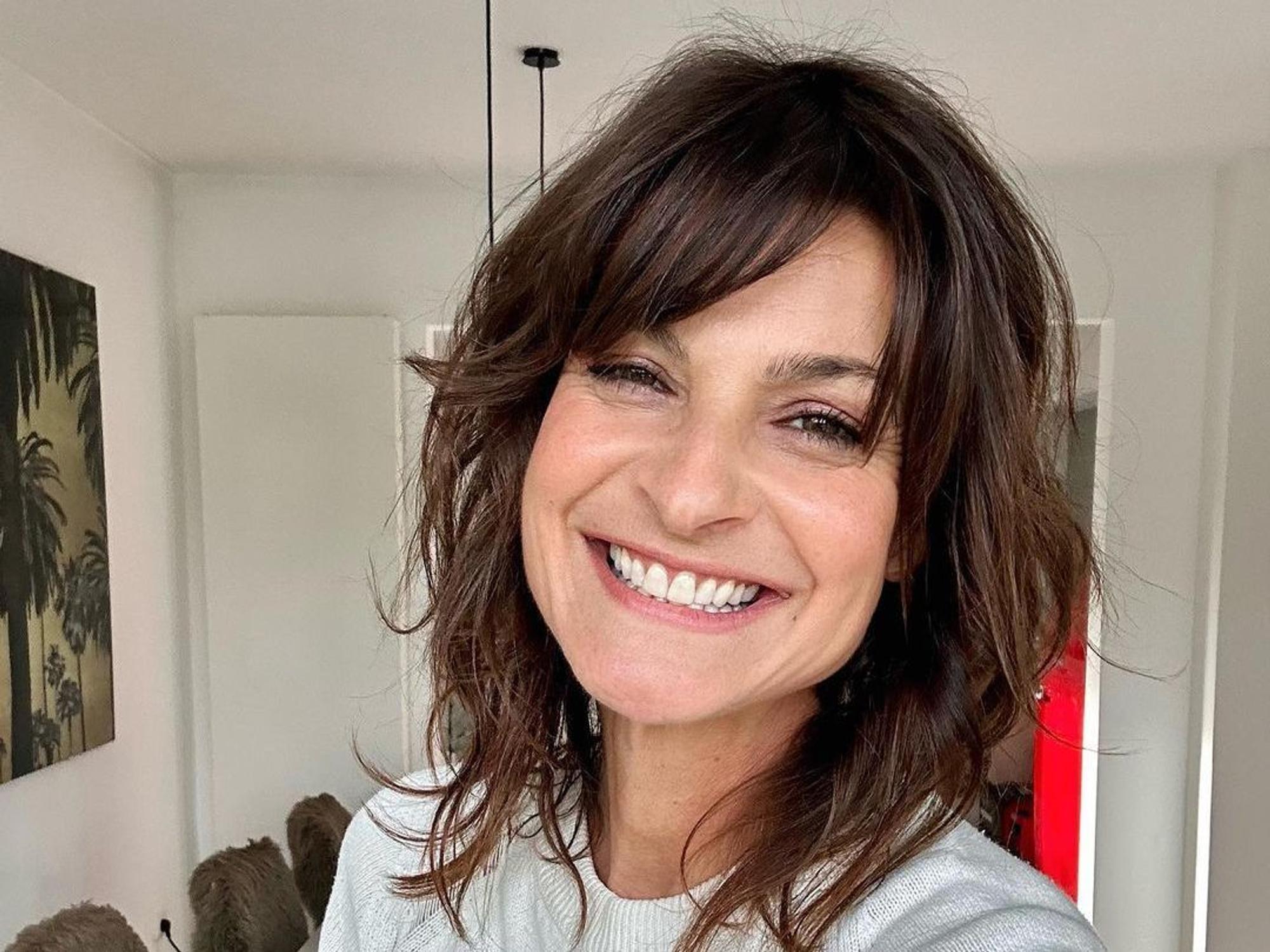 Das Selfie zeigt die Sat.1-„Frühstücksfernsehen“-Moderatorin Marlene Lufen, die breit in die Kamera grinst.