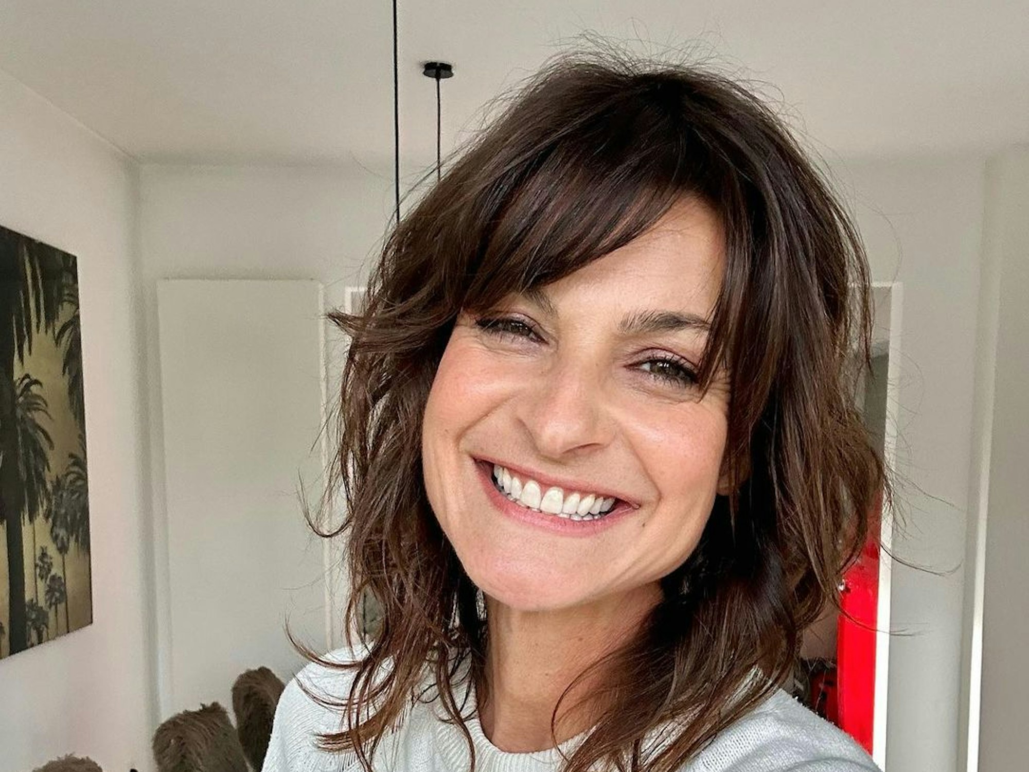 Das Selfie zeigt die Sat.1-„Frühstücksfernsehen“-Moderatorin Marlene Lufen, die breit in die Kamera grinst.