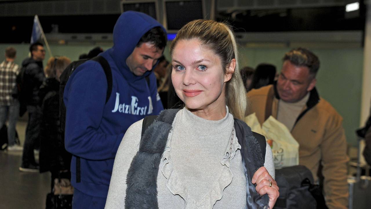 Yvonne Woelke, hier gemeinsam mit Lucas Cordalis (l.) und Peter Klein am Frankfurter Flughafen