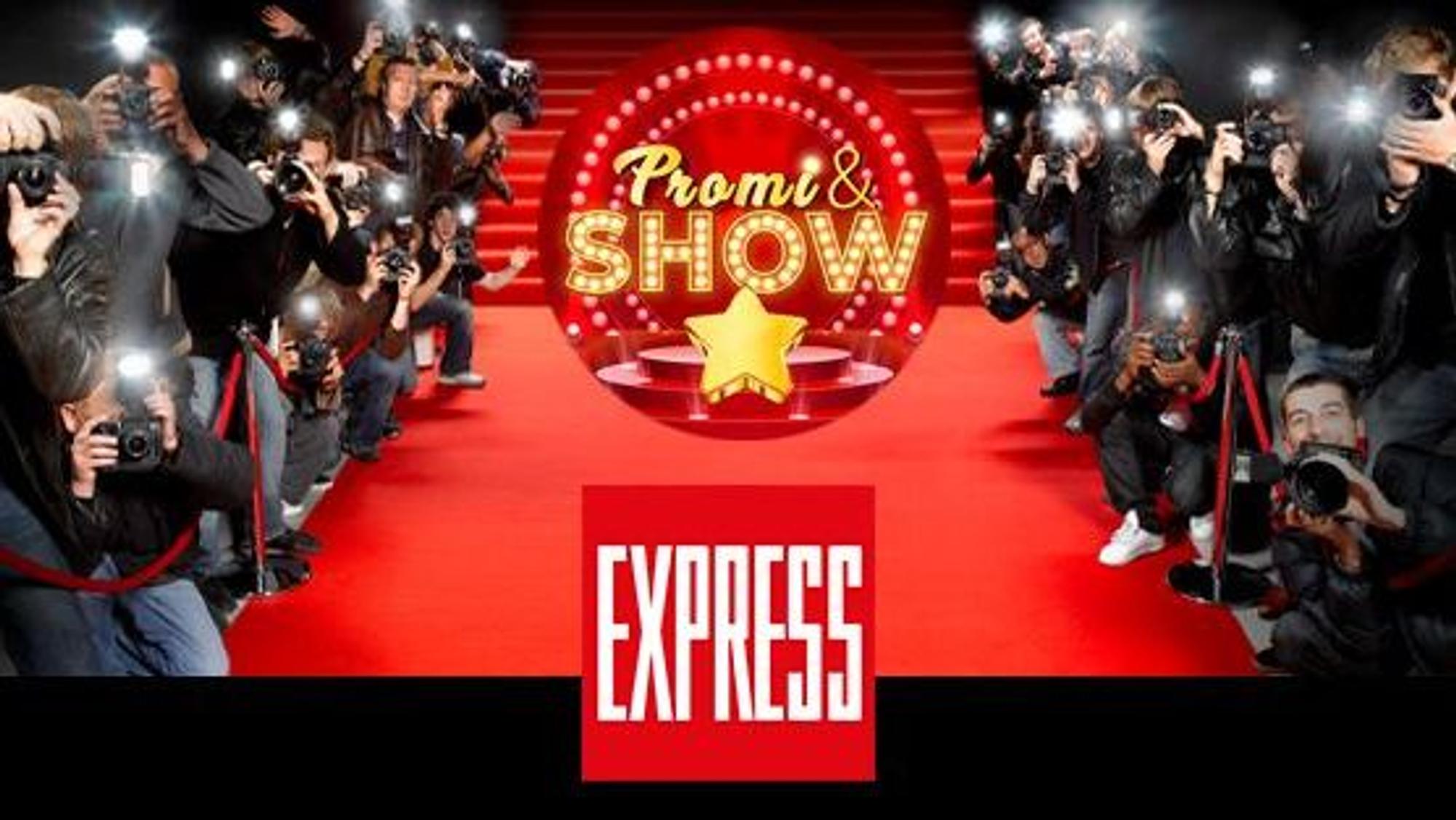 Fotografen am roten Teppich, auf dem das Logo des EXPRESS und von Promi & Show zu sehen sind.