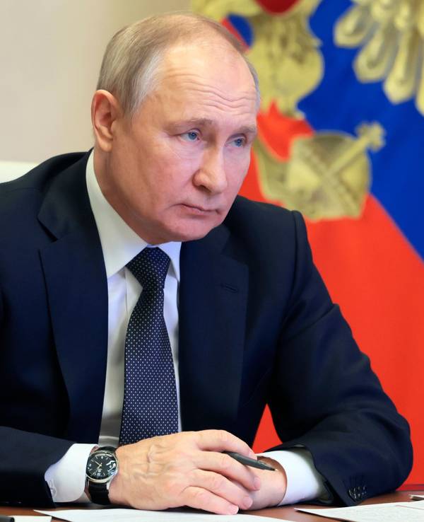 Russian President Vladimir Putin attends an event marking the 30th anniversary of the national energy giant Gazprom, via a video conference at the Novo-Ogaryovo state residence, outside Moscow, Russia, Friday, Feb. 17, 2023. (Mikhail Metzel, Sputnik, Kremlin Pool Photo via AP)