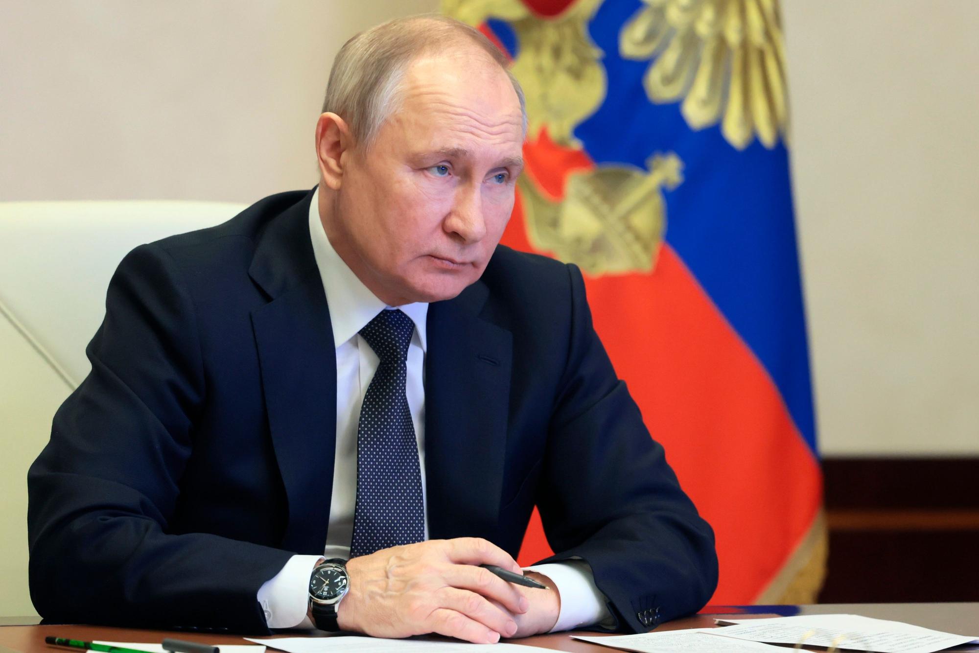 Russian President Vladimir Putin attends an event marking the 30th anniversary of the national energy giant Gazprom, via a video conference at the Novo-Ogaryovo state residence, outside Moscow, Russia, Friday, Feb. 17, 2023. (Mikhail Metzel, Sputnik, Kremlin Pool Photo via AP)