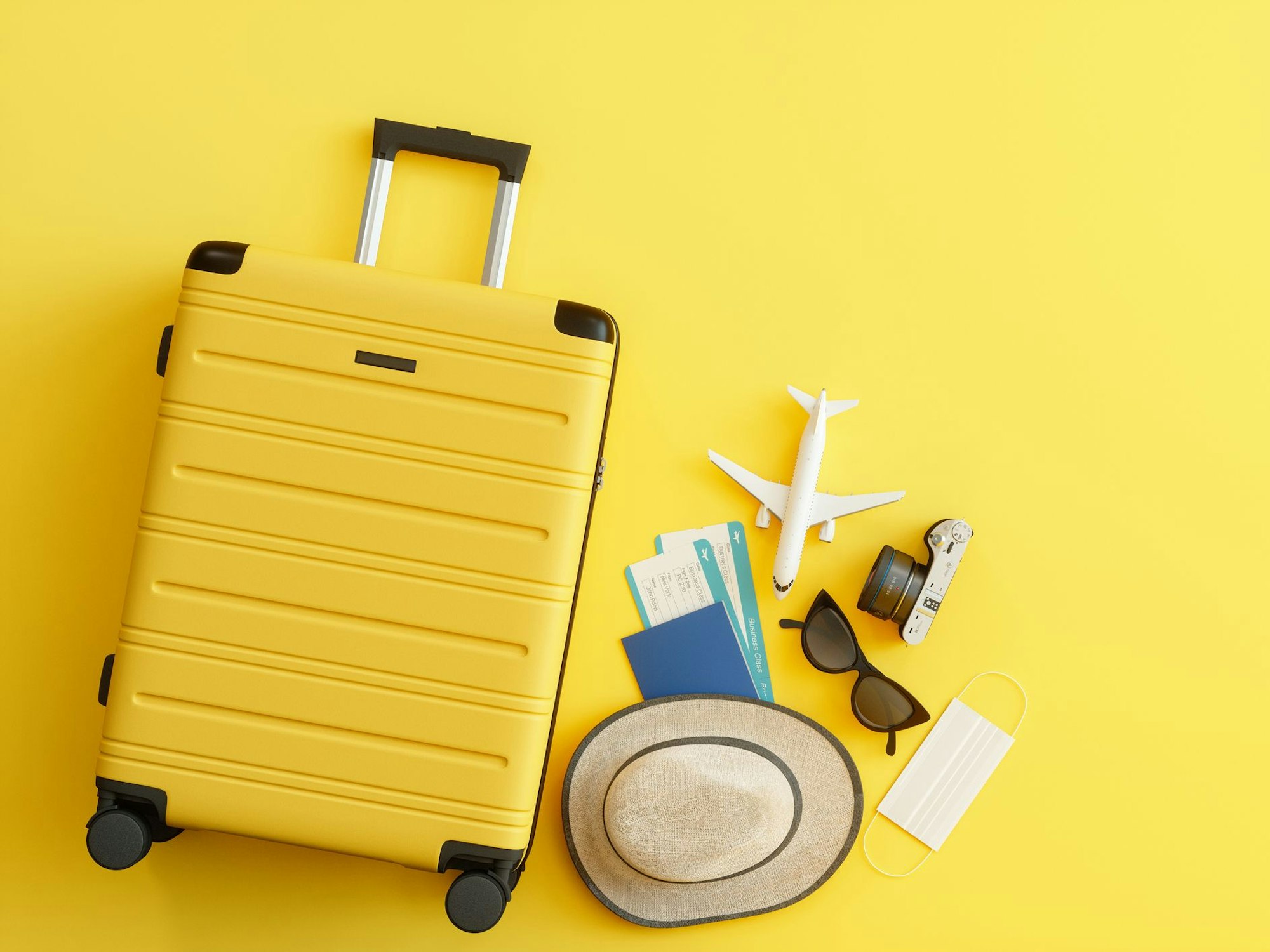 Ein gelber Handgepäckkoffer