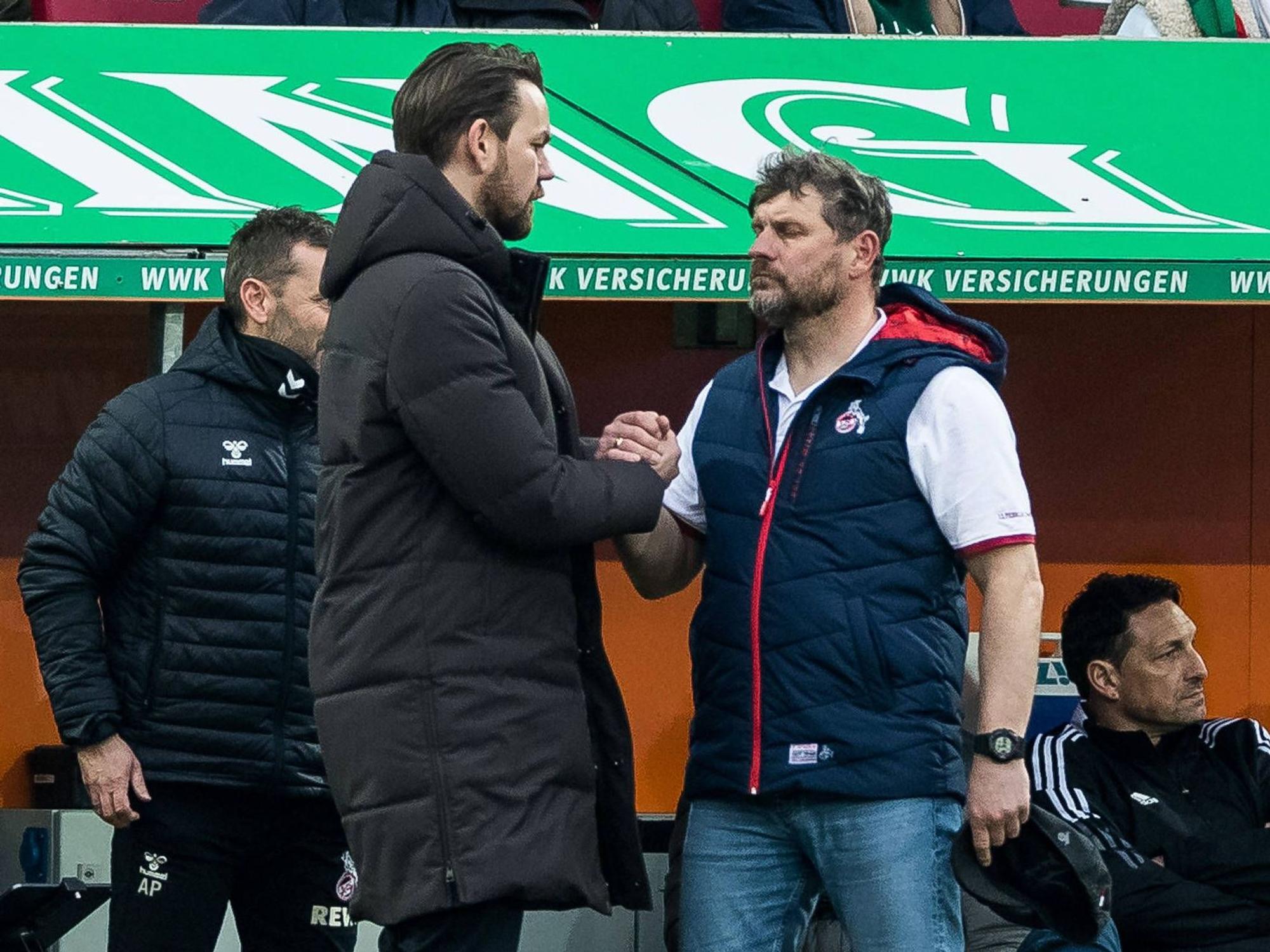 Thomas Kessler und Steffen Baumgart klatschen sich ab.