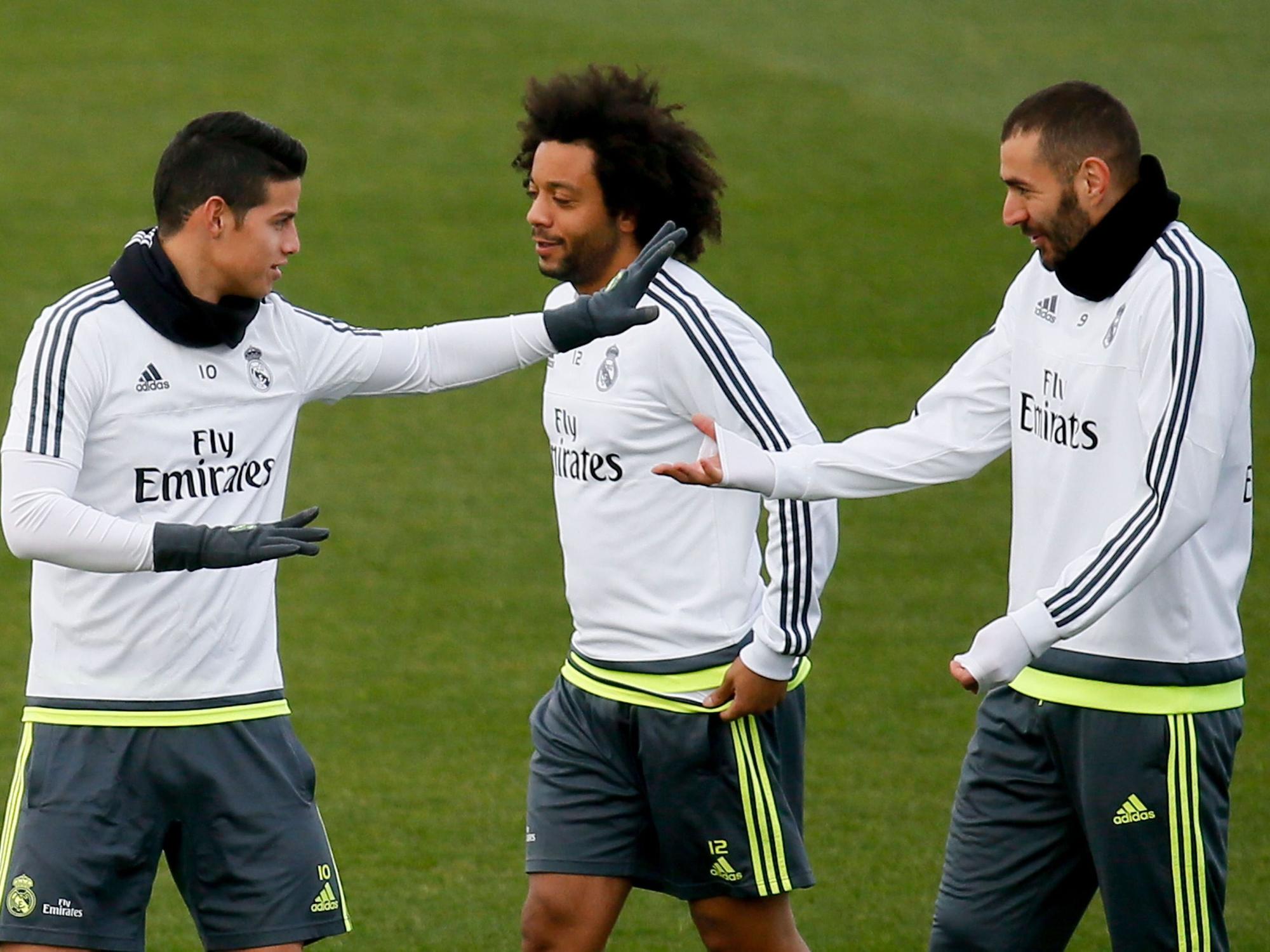 James Rodriguez (l.), Marcelo (m.) und Karim Benzema (r.) beim Training von Real Madrid am 12. Dezember 2015.