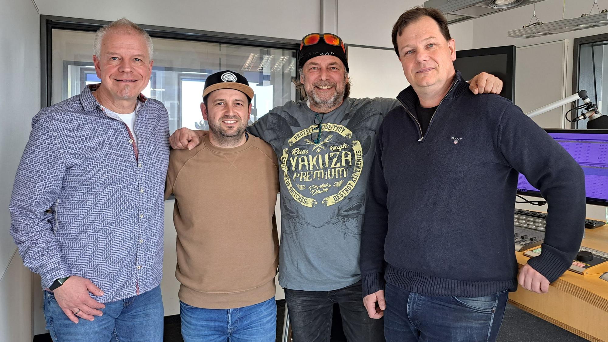 (v.l.n.r.): Michael Wandel, Moderator Dominik Becker, Wilfried Wiltschek und Thomas Wagner