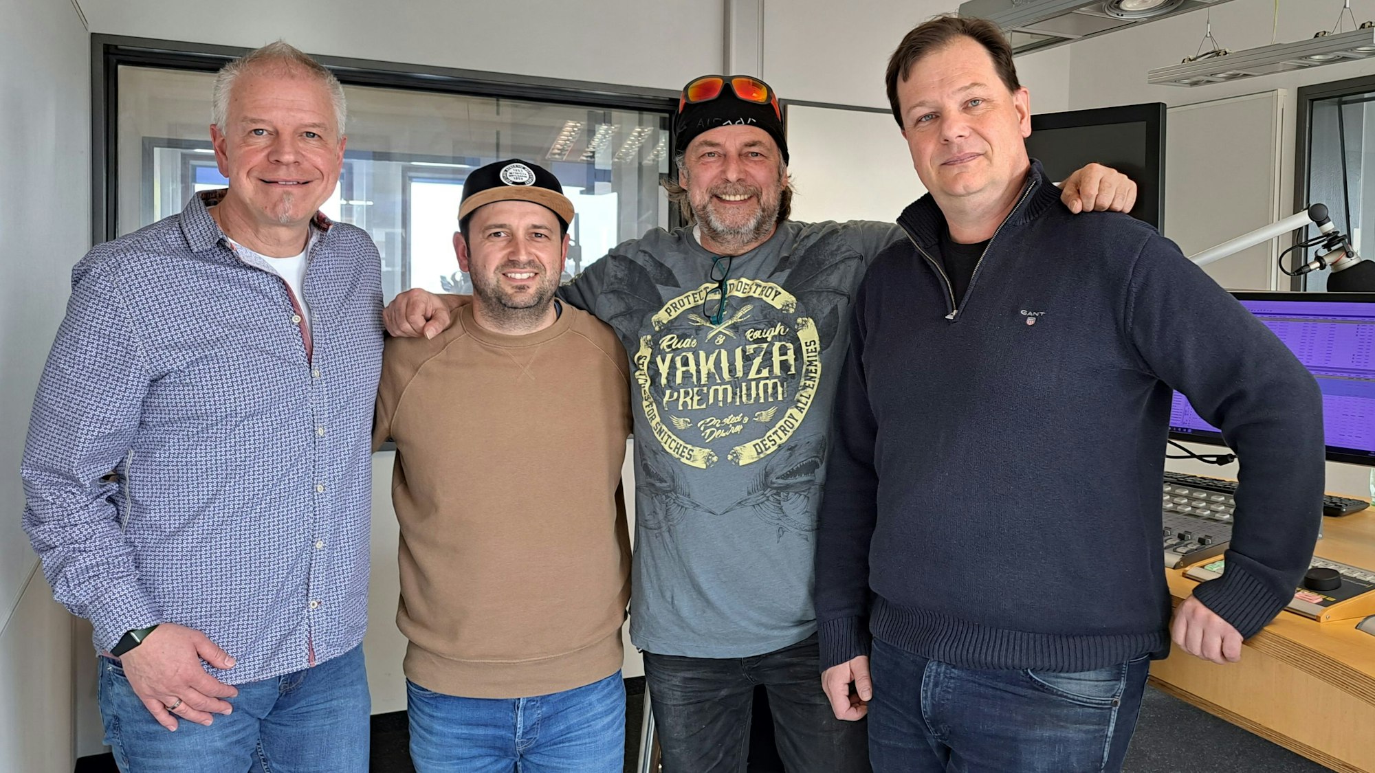 (v.l.n.r.): Michael Wandel, Moderator Dominik Becker, Wilfried Wiltschek und Thomas Wagner