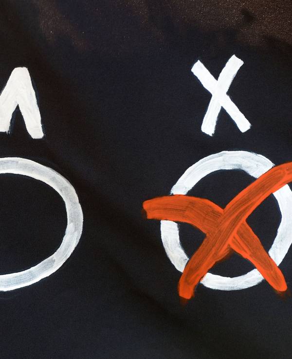 Drei Kreise zum Ankreuzen, darüber die Buchstaben W, M und X.