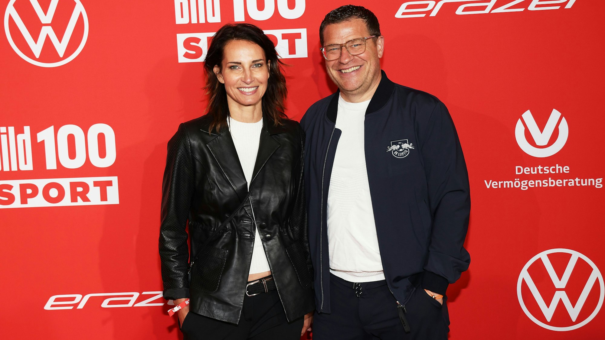 Max Eberl und Natascha Fruscella auf dem Roten Teppich bei der Veranstaltung "BILD 100" in Berlin.