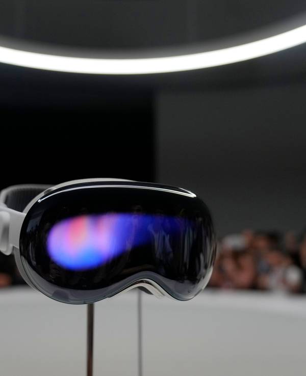 The Apple Vision Pro headset is displayed in a showroom on the Apple campus in Cupertino, Calif., at the company's annual developers conference, Monday, June 5, 2023. (AP Photo/Jeff Chiu)