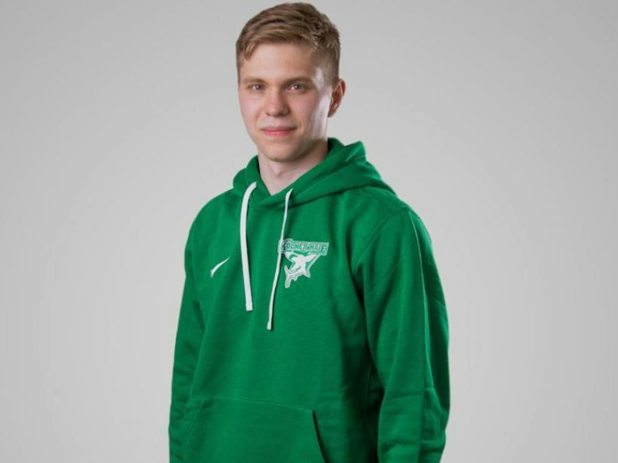 Grüner Hoodie für die Kölner Haie und ihre Fans.