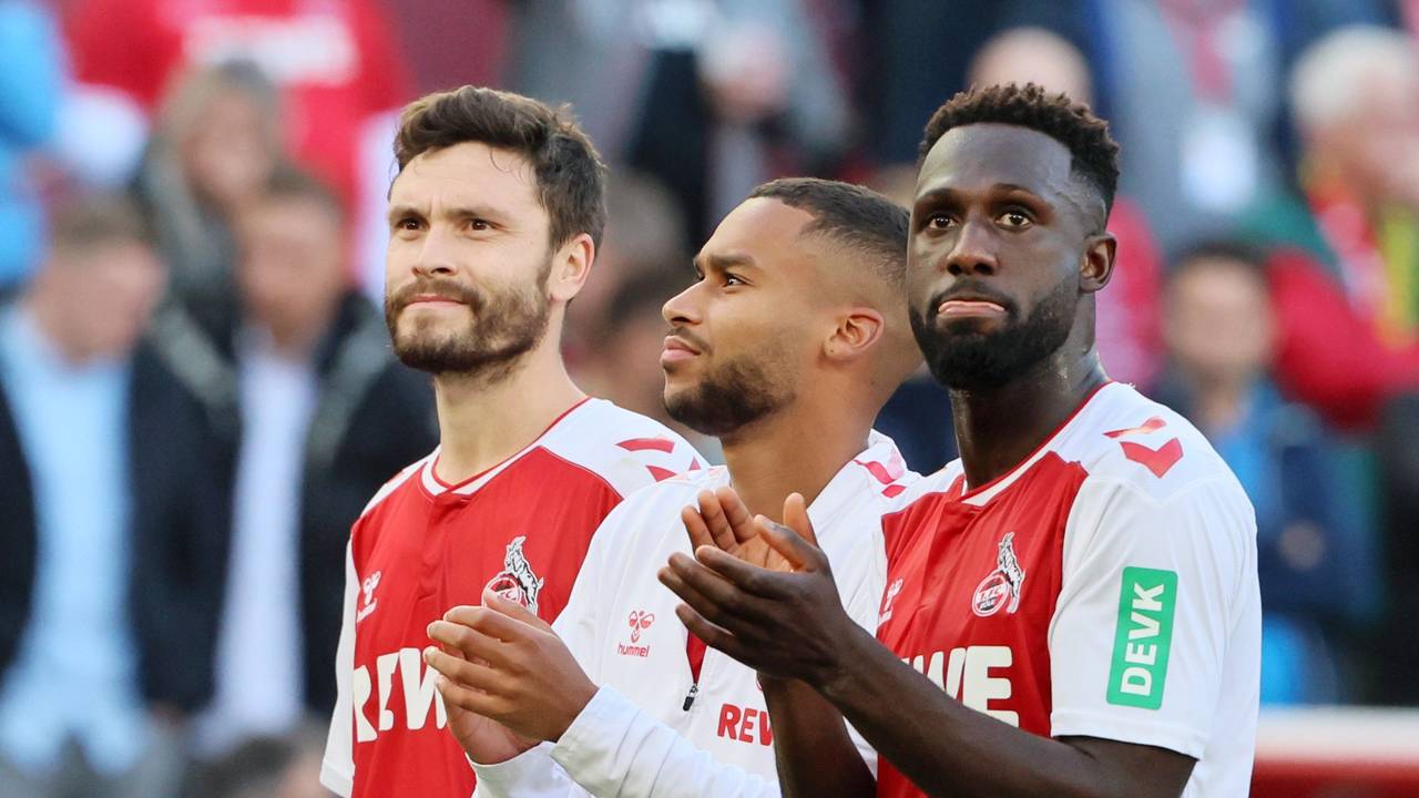 Jonas Hector, Linton Maina und Kingsley Schindler stehen nebeneinander.