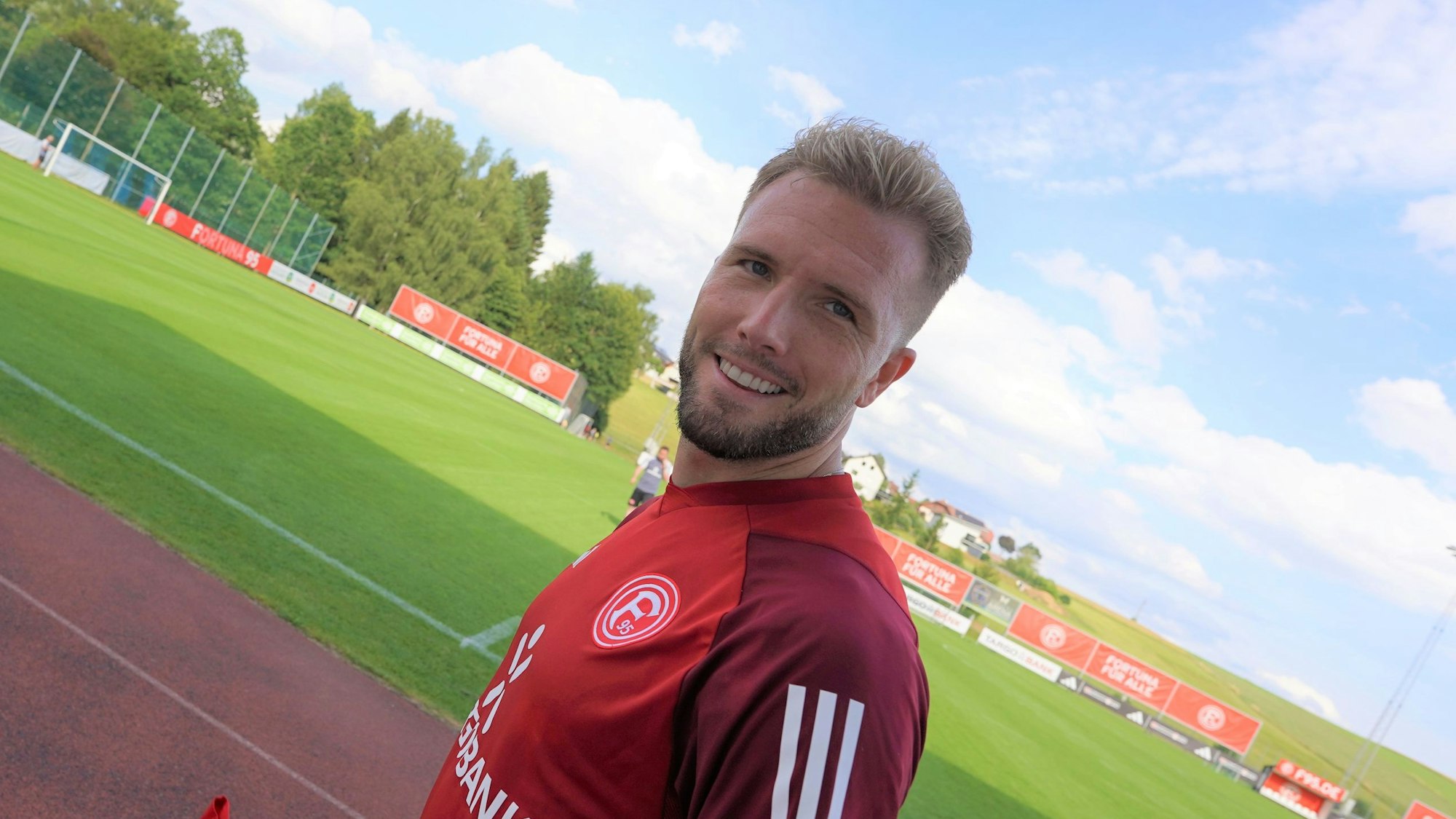 Andre Hoffmann lächelt in die Kamera