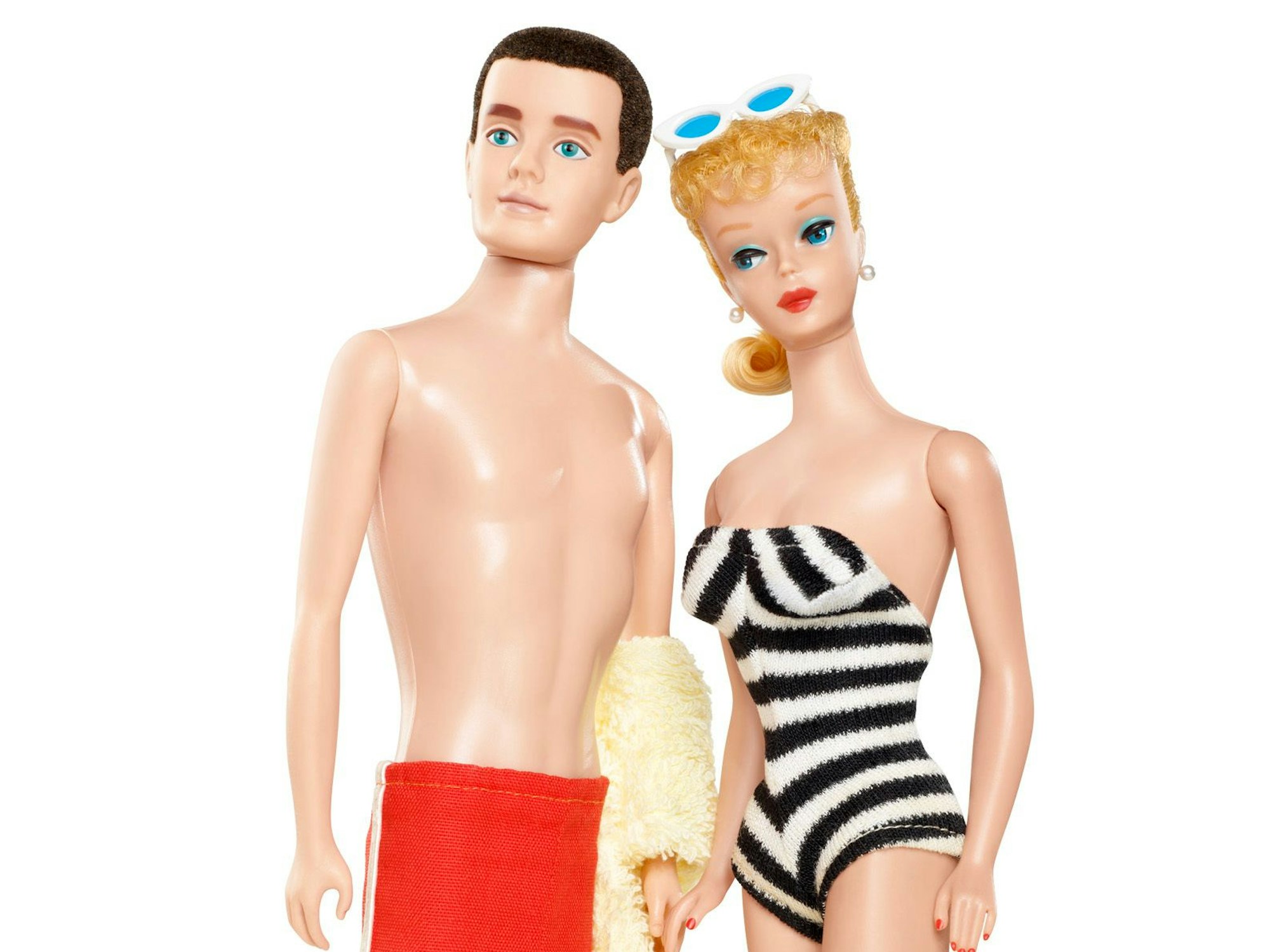 Die "Teenage Fashion Model Barbie" von 1959 und der Ken von 1961.