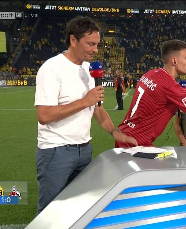 Lothar Matthäus und Dejan Ljubicic nach dem Topspiel zwischen Borussia Dortmund und dem 1. FC Köln im Signal-Iduna-Park beim Handshake. Daneben stehen Sebastian Hellmann und Julia Simic.