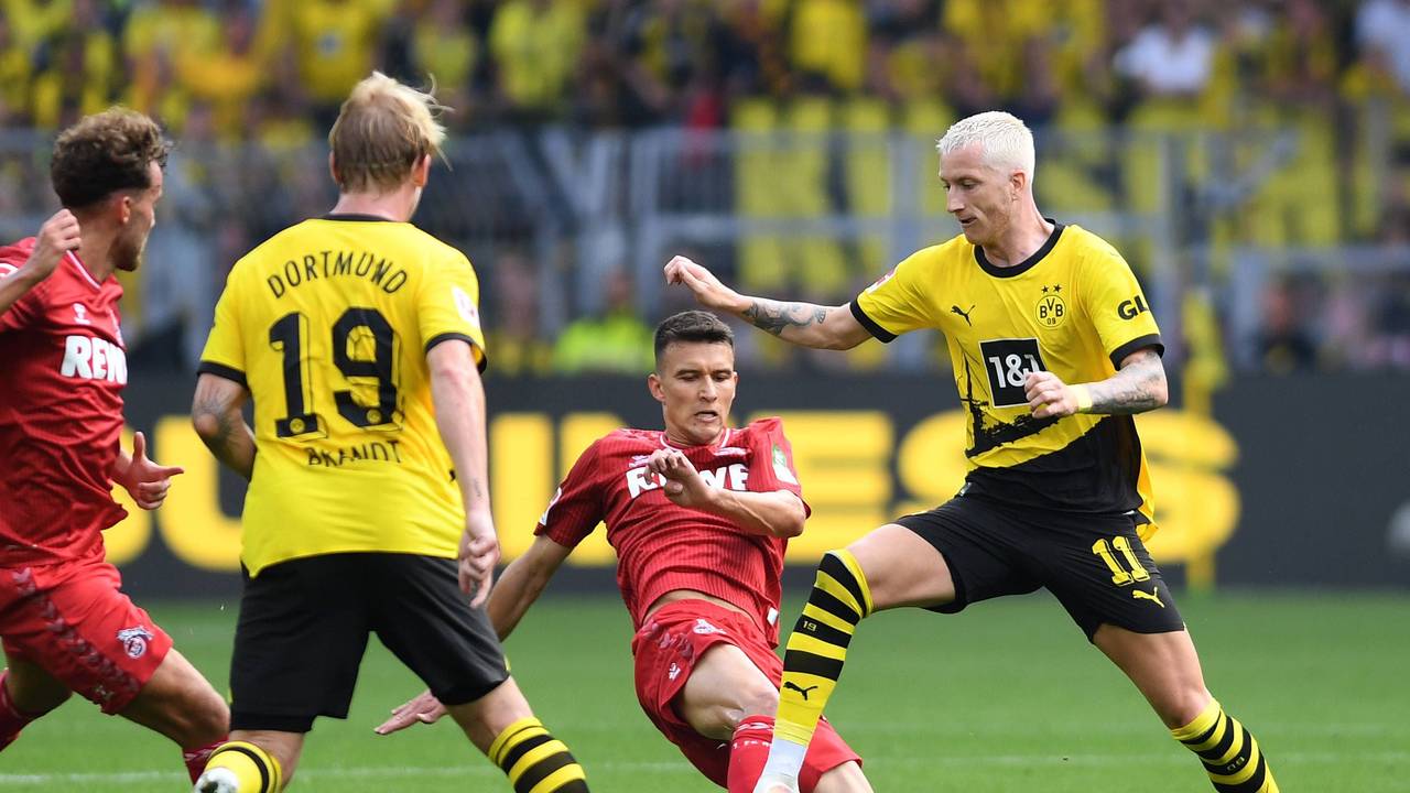 Marco Reus beim BVB-Heimspiel gegen den 1. FC Köln im Zweikampf mit Dejan Ljubicic.