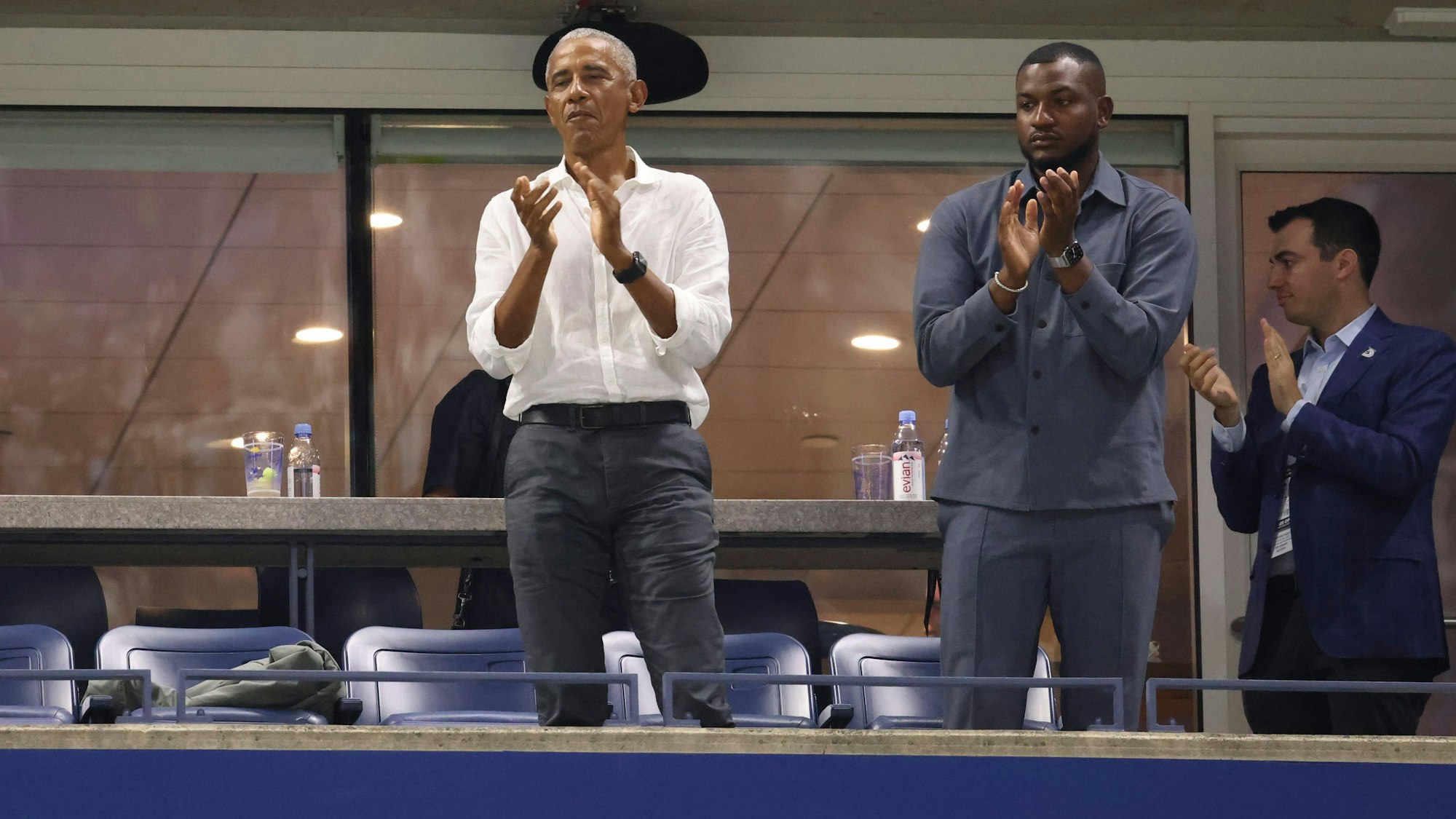 President Barack Obama applauds Coco Gauff, of the United States, after she won her match against Laura Siegemund, of Germany, during the first round of the U.S. Open tennis championships, Monday, Aug. 28, 2023, in New York. (AP Photo/Jason DeCrow)