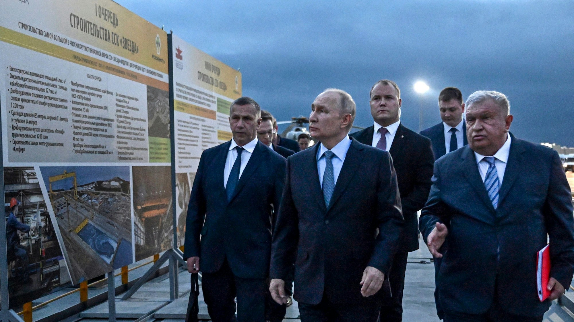 Russian President Vladimir Putin, center, and Russian CEO of Rosneft oil company Igor Sechin, right, visit "Zvezda" Shipbuilding Complex in the Bay of Bolshoy Kamen, in the far eastern region of Primorsky Krai, Russia, Monday, Sept. 11, 2023. (Pavel Bednyakov, Sputnik, Kremlin Pool Photo via AP)