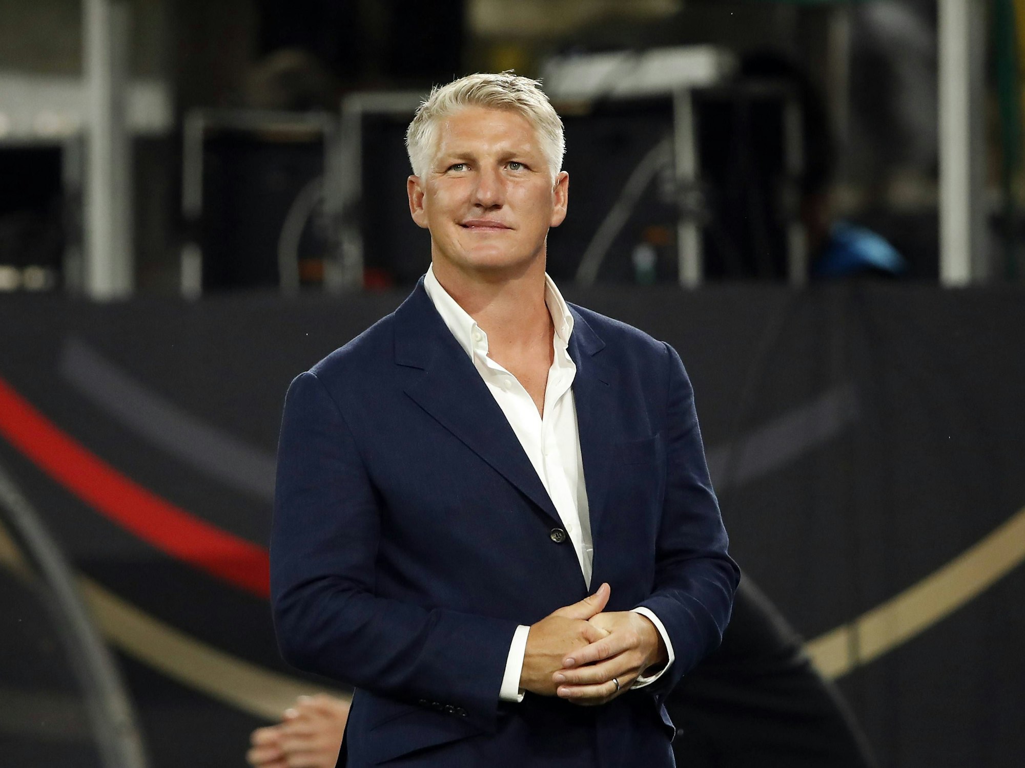 Bastian Schweinsteiger im Anzug.