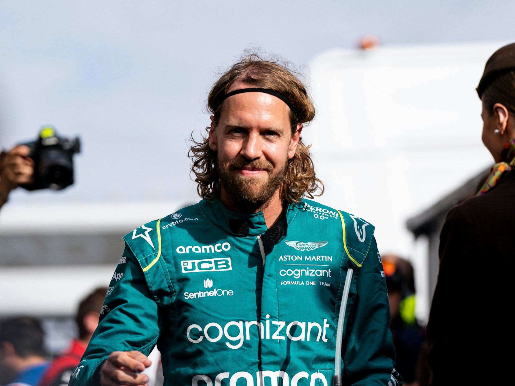 Sebastian Vettel lächelt.