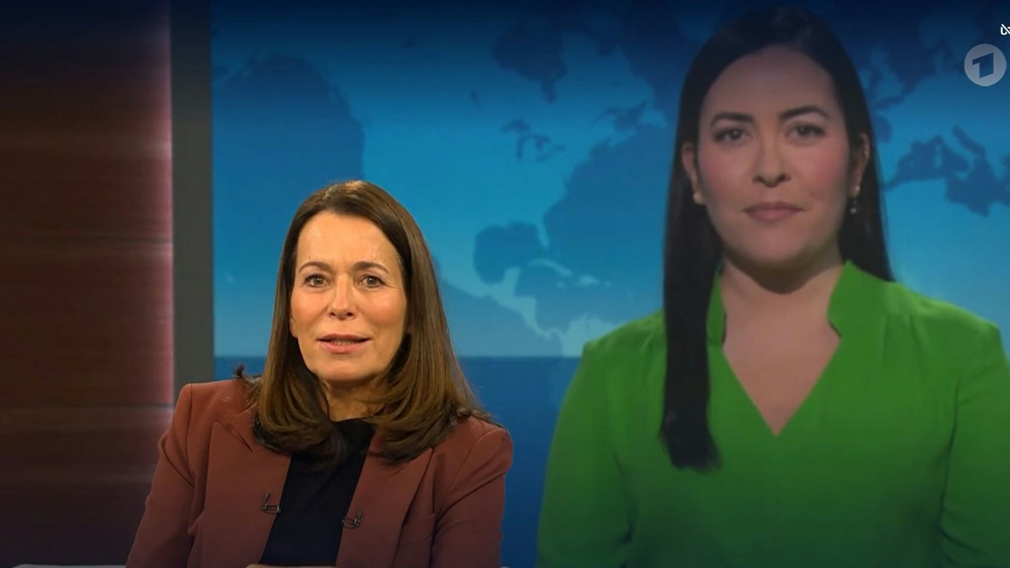 Moderatorin Anne Will schaltet am Ende ihrer Sendung am 26. November zu den „Tagesthemen“ mit Moderatorin Aline Abboud. Der Begriff „Geiselaustausch“ sorgt für große Kritik.