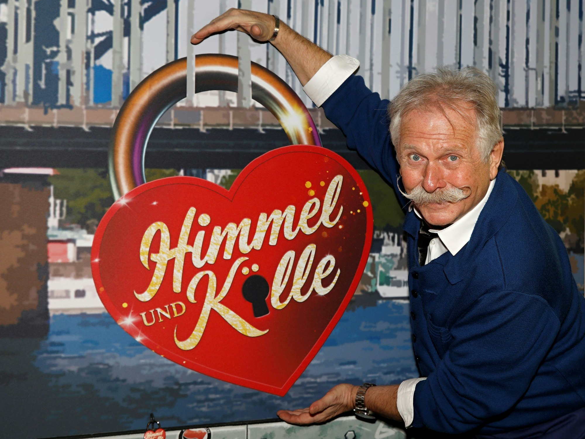 Henning Krautmacher in der Kulisse von Himmel und Kölle.